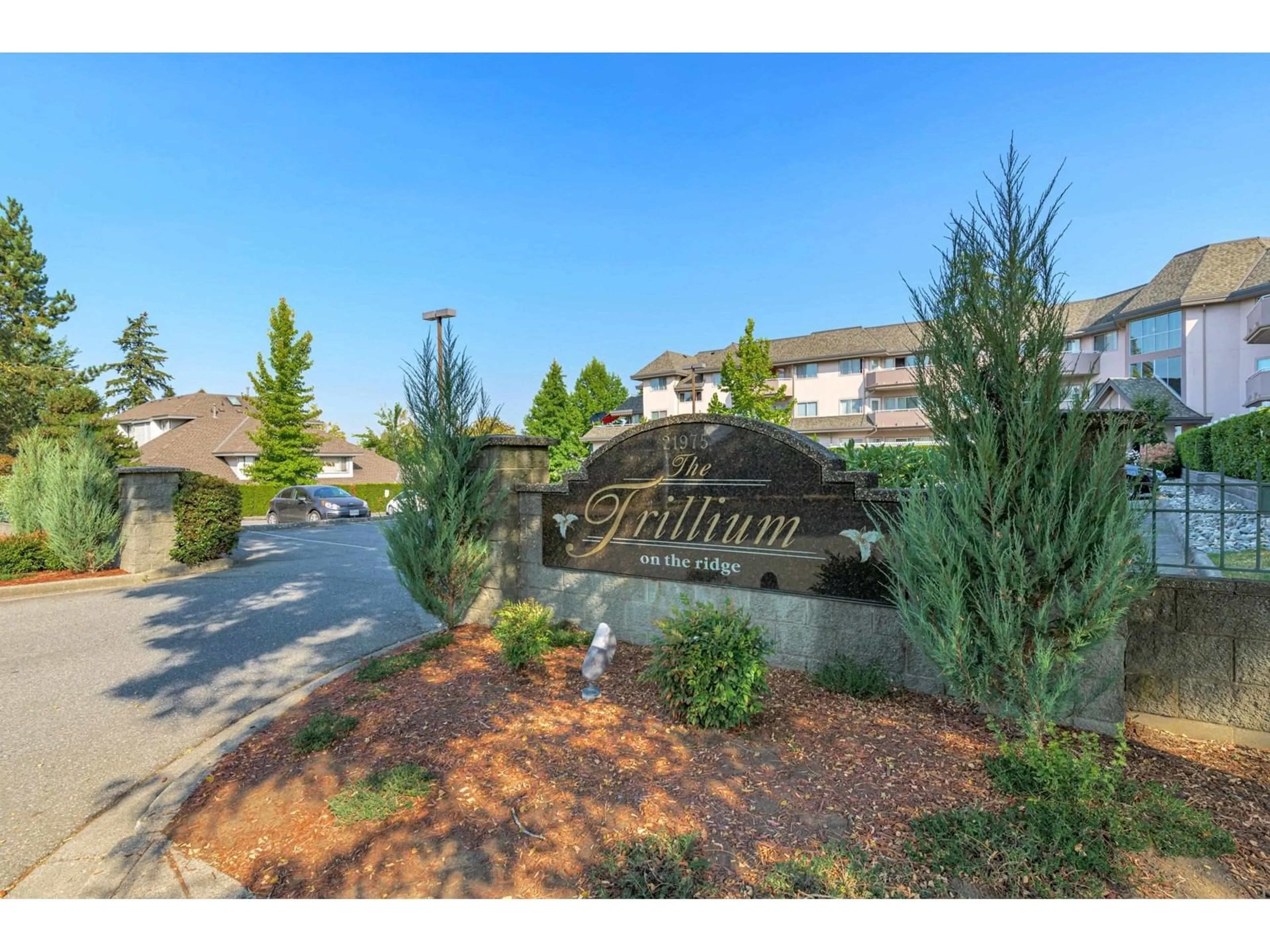 A pic from outside/outdoor area/front of a property/back of a property/a pic from drone, street for 212 21975 49 AVENUE, Langley British Columbia V3A8J7