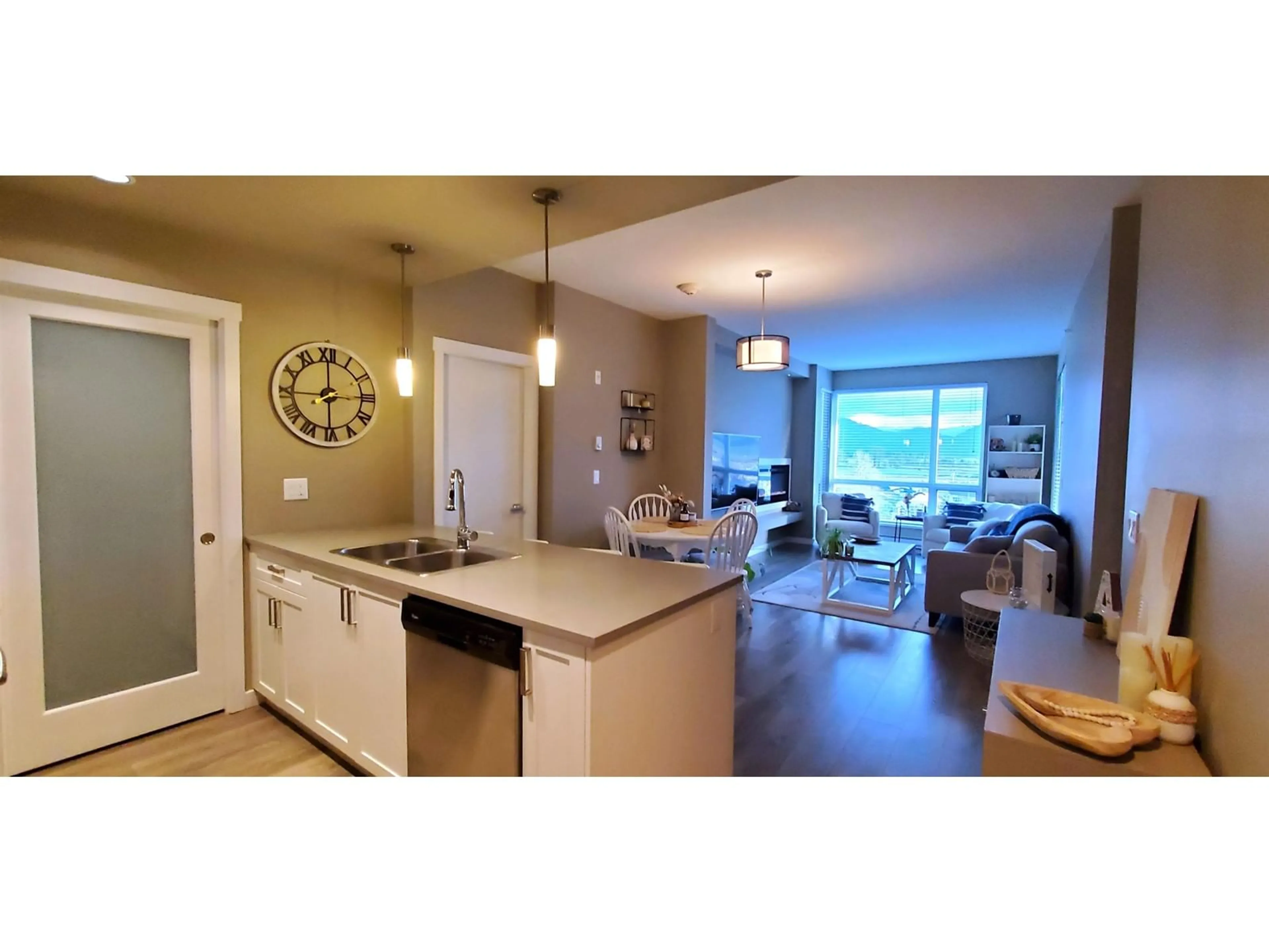 Open concept kitchen, unknown for 409 2242 WHATCOM ROAD, Abbotsford British Columbia V3G0G3