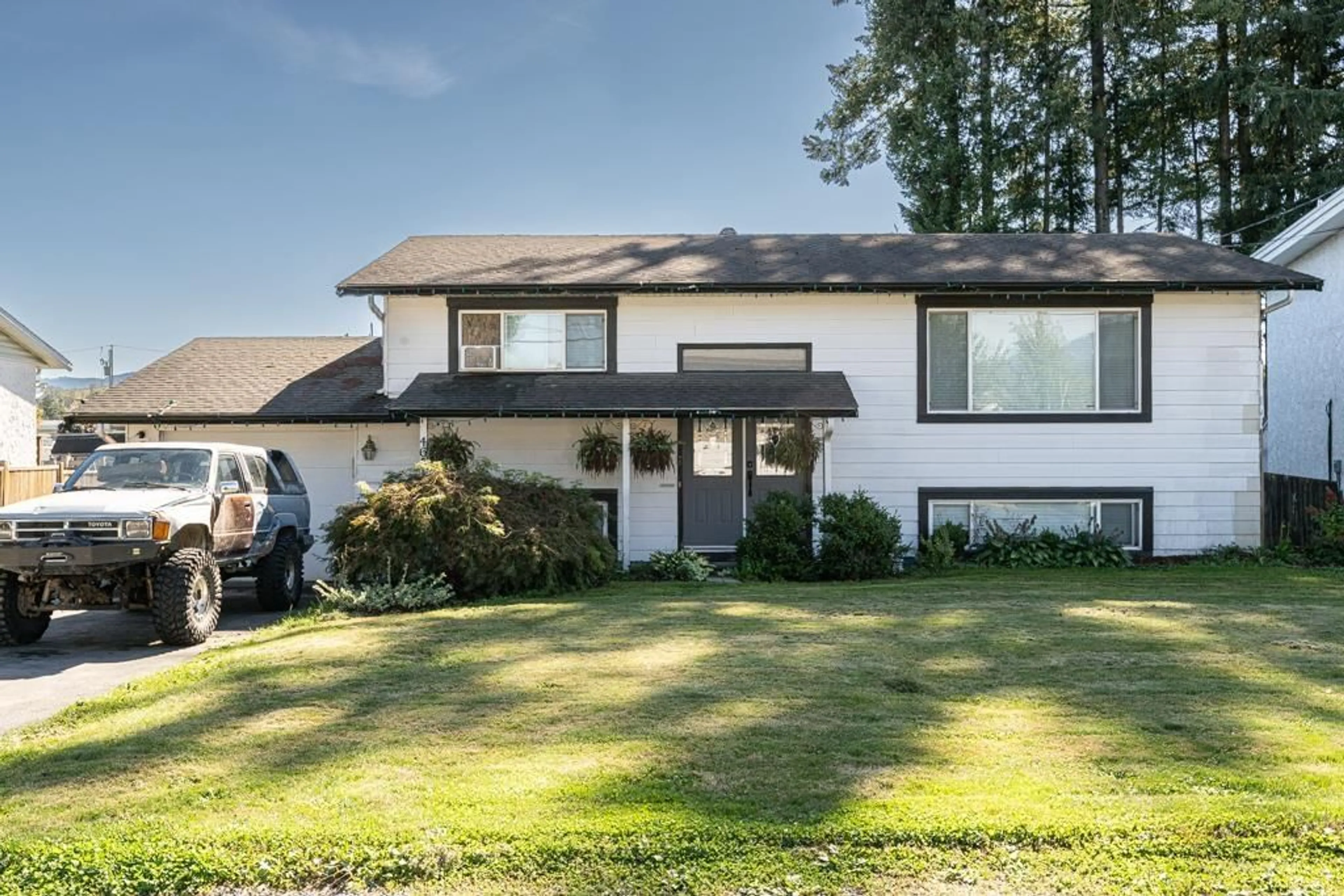 Home with vinyl exterior material, street for 46512 BRICE ROAD|Fairfield Island, Chilliwack British Columbia V2P3V5