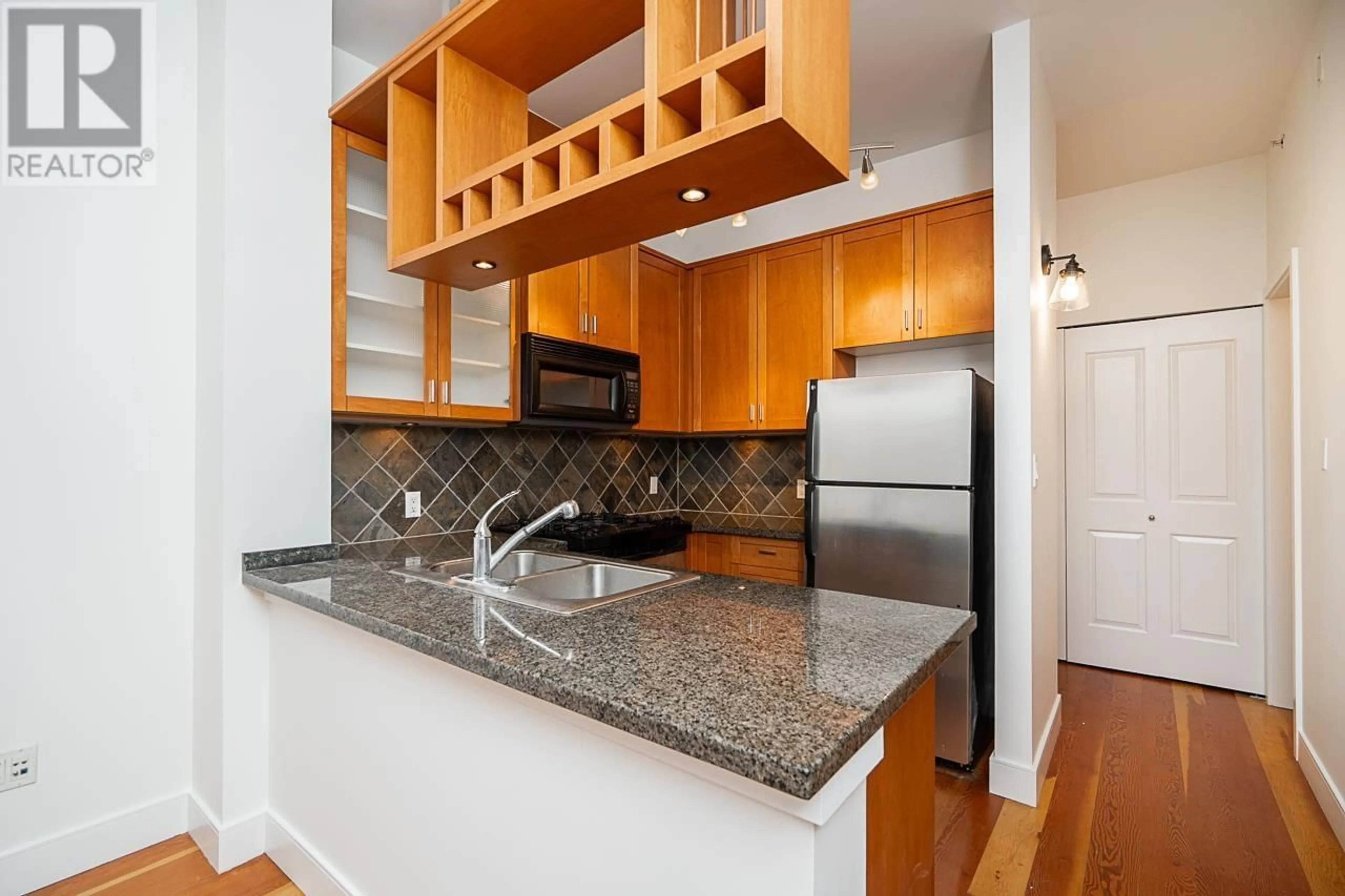 Standard kitchen, wood/laminate floor for 401 8988 HUDSON STREET, Vancouver British Columbia V6P6Z1