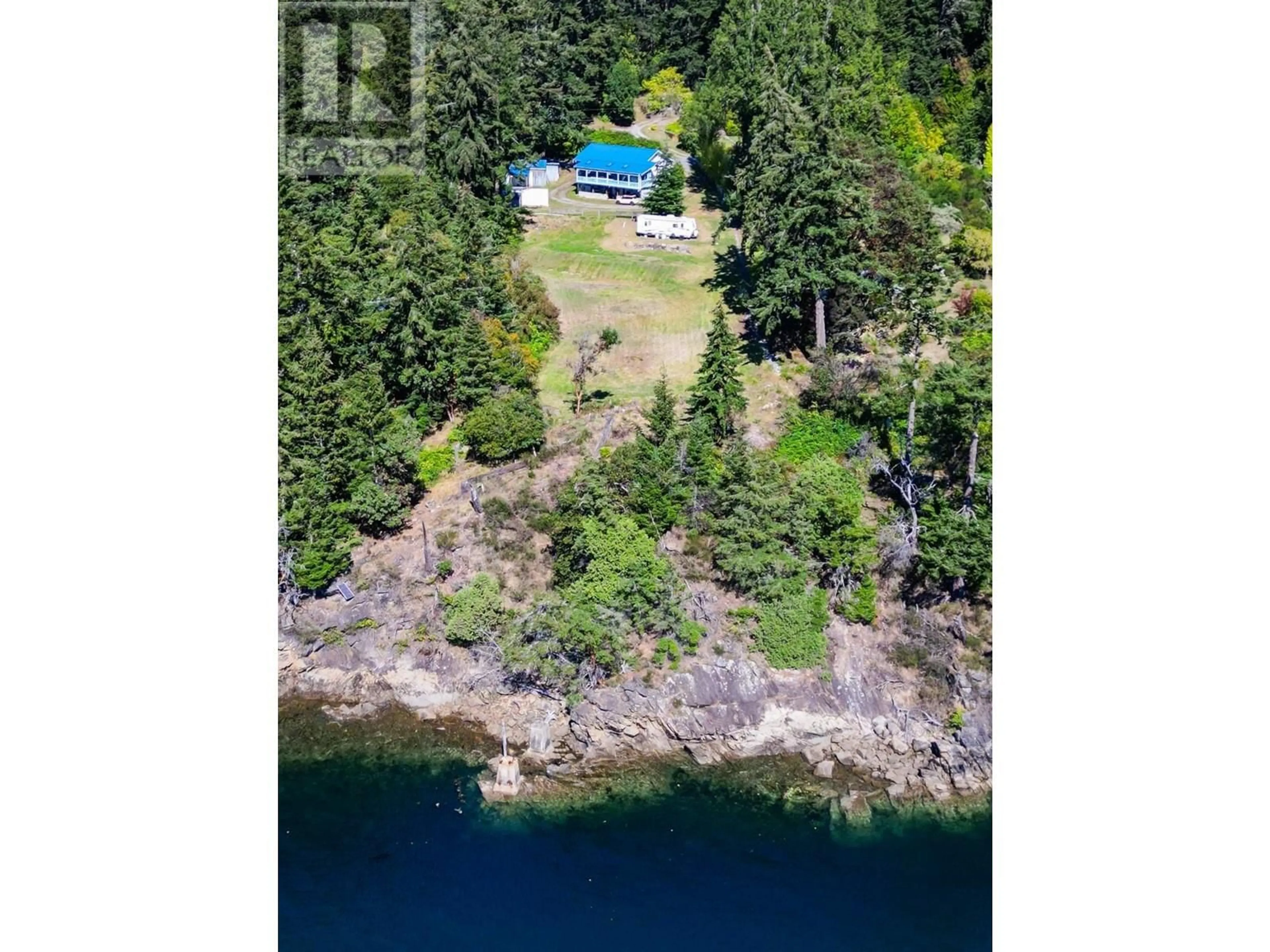 A pic from outside/outdoor area/front of a property/back of a property/a pic from drone, water/lake/river/ocean view for 1325 MACKINNON ROAD, Pender Island British Columbia V0N2M1