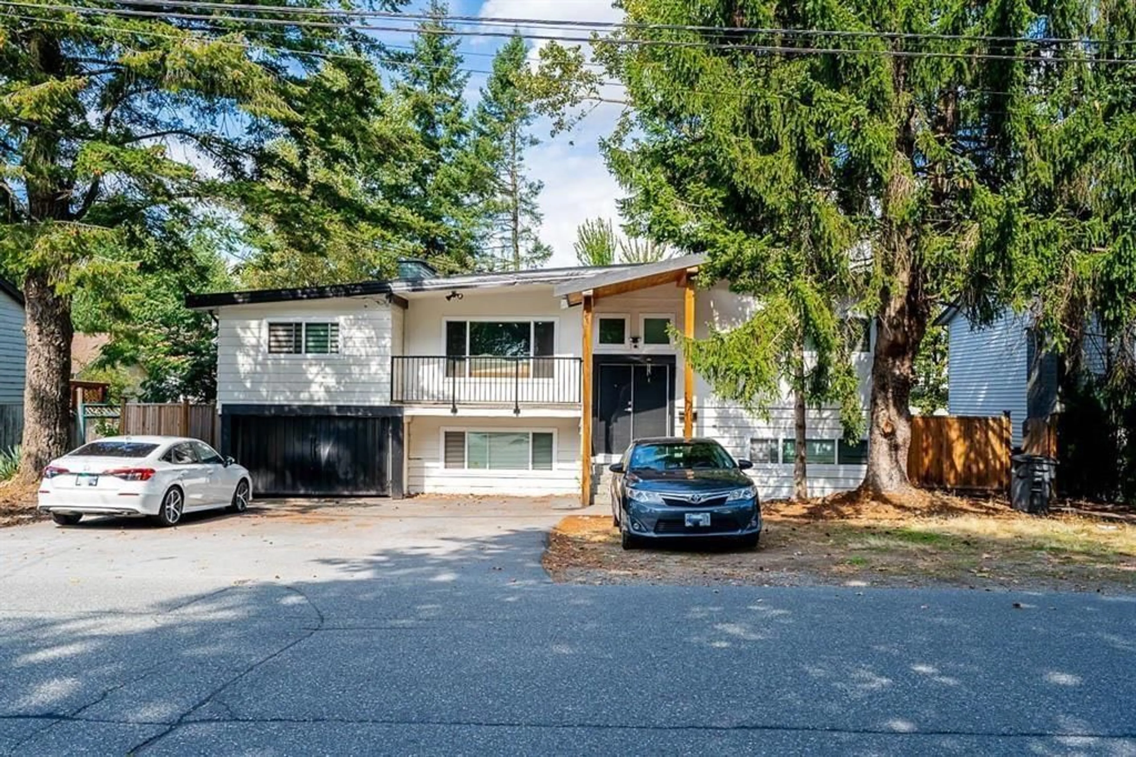 Home with vinyl exterior material, street for 14125 75 AVENUE, Surrey British Columbia V3W2S9