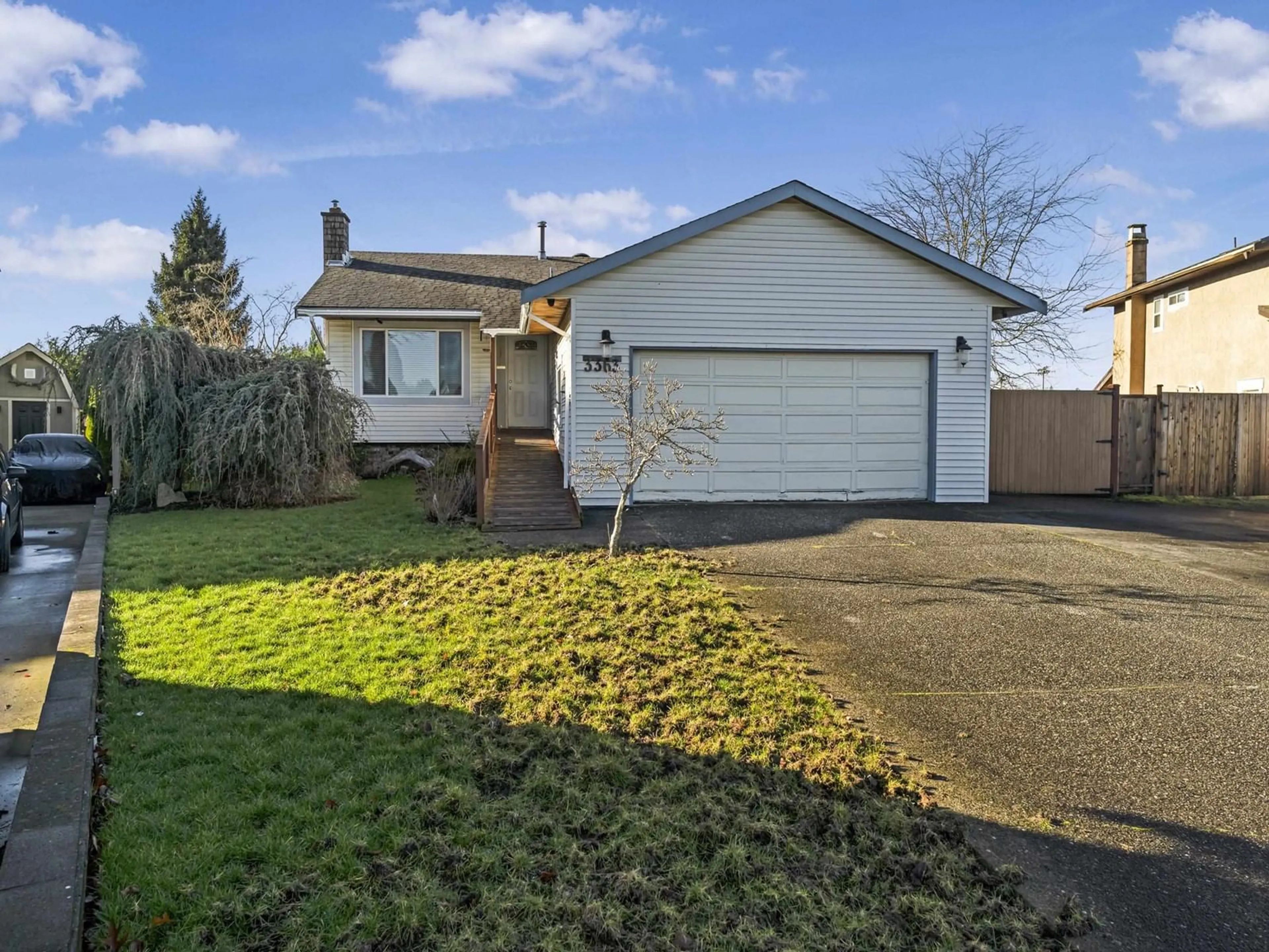 A pic from outside/outdoor area/front of a property/back of a property/a pic from drone, street for 3363 OKANAGAN DRIVE, Abbotsford British Columbia V2T4Z2