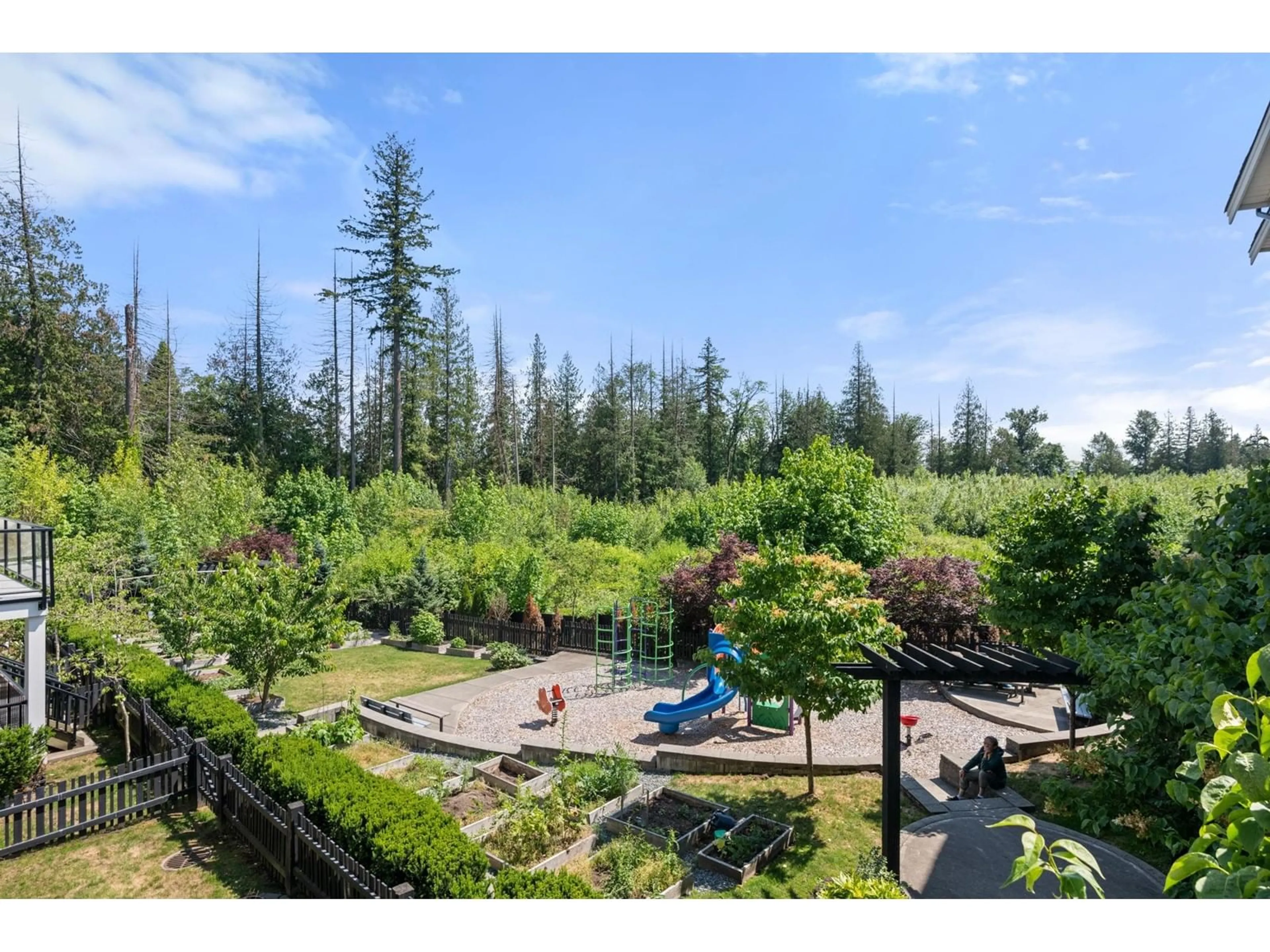 A pic from outside/outdoor area/front of a property/back of a property/a pic from drone, forest/trees view for 14 21150 76A AVENUE, Langley British Columbia V2Y0V9