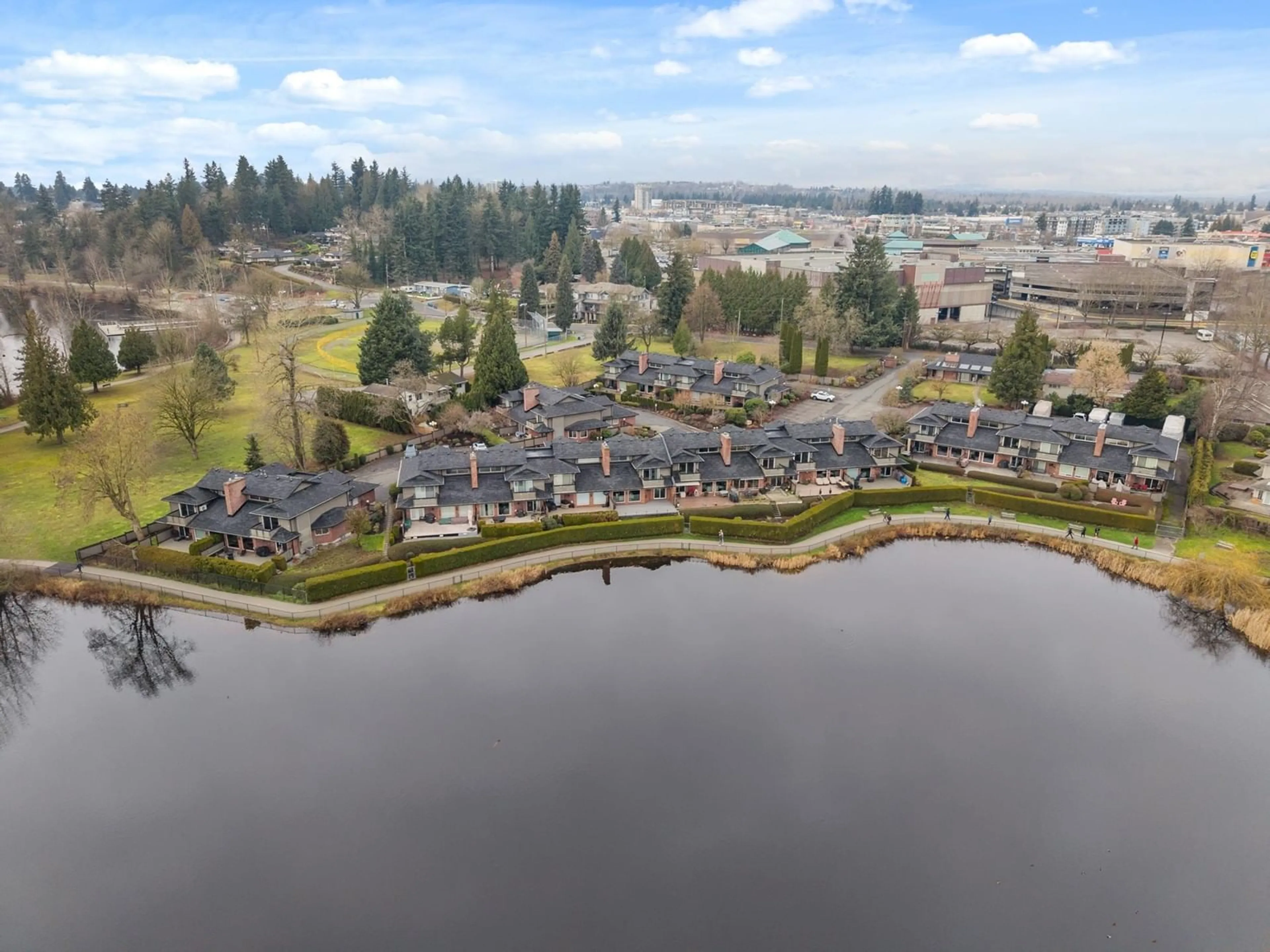 A pic from outside/outdoor area/front of a property/back of a property/a pic from drone, water/lake/river/ocean view for 12 33000 MILL LAKE ROAD, Abbotsford British Columbia V2S2A3