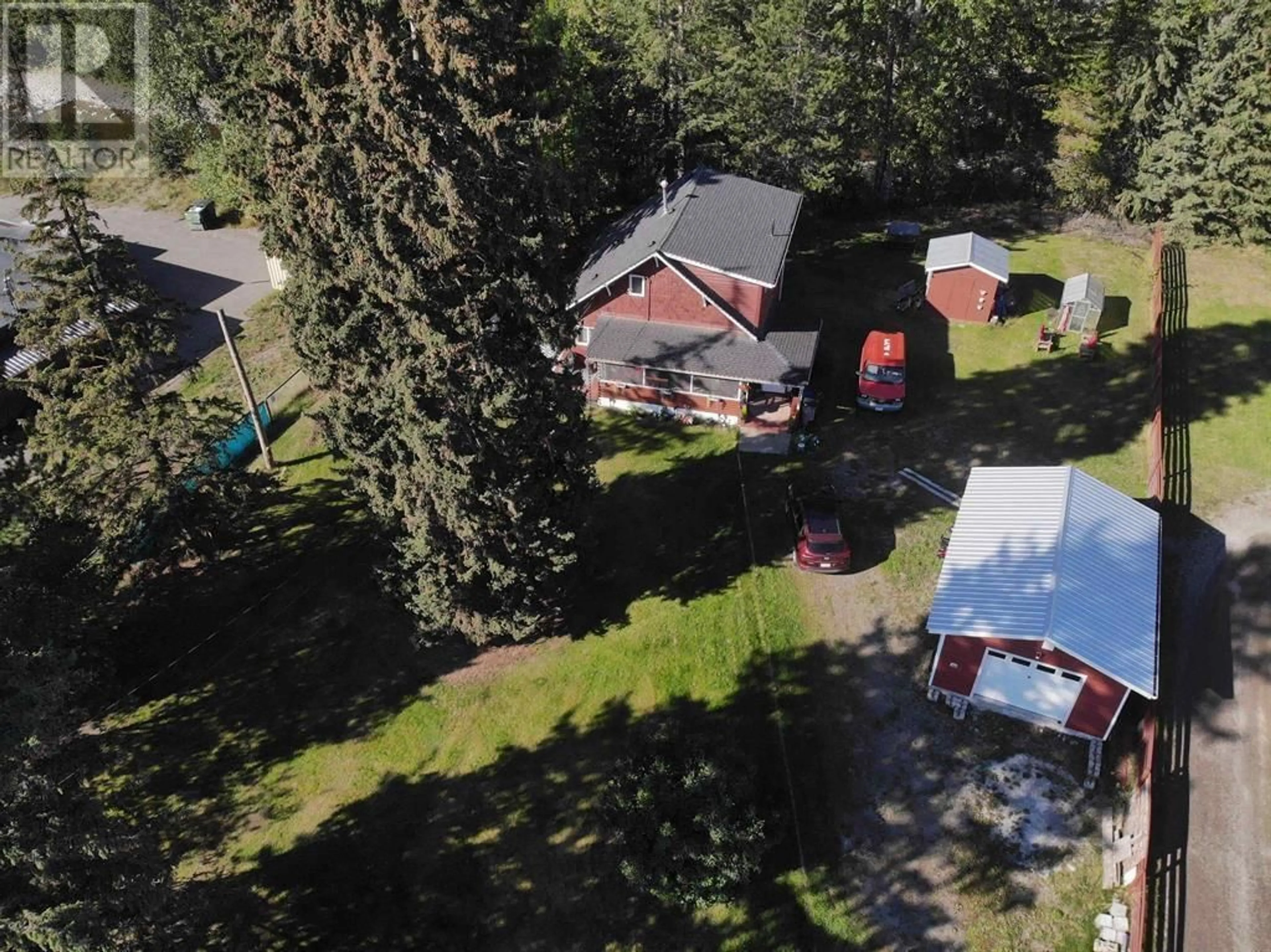 A pic from outside/outdoor area/front of a property/back of a property/a pic from drone, street for 213 BAKER DRIVE, Quesnel British Columbia V2J1T8