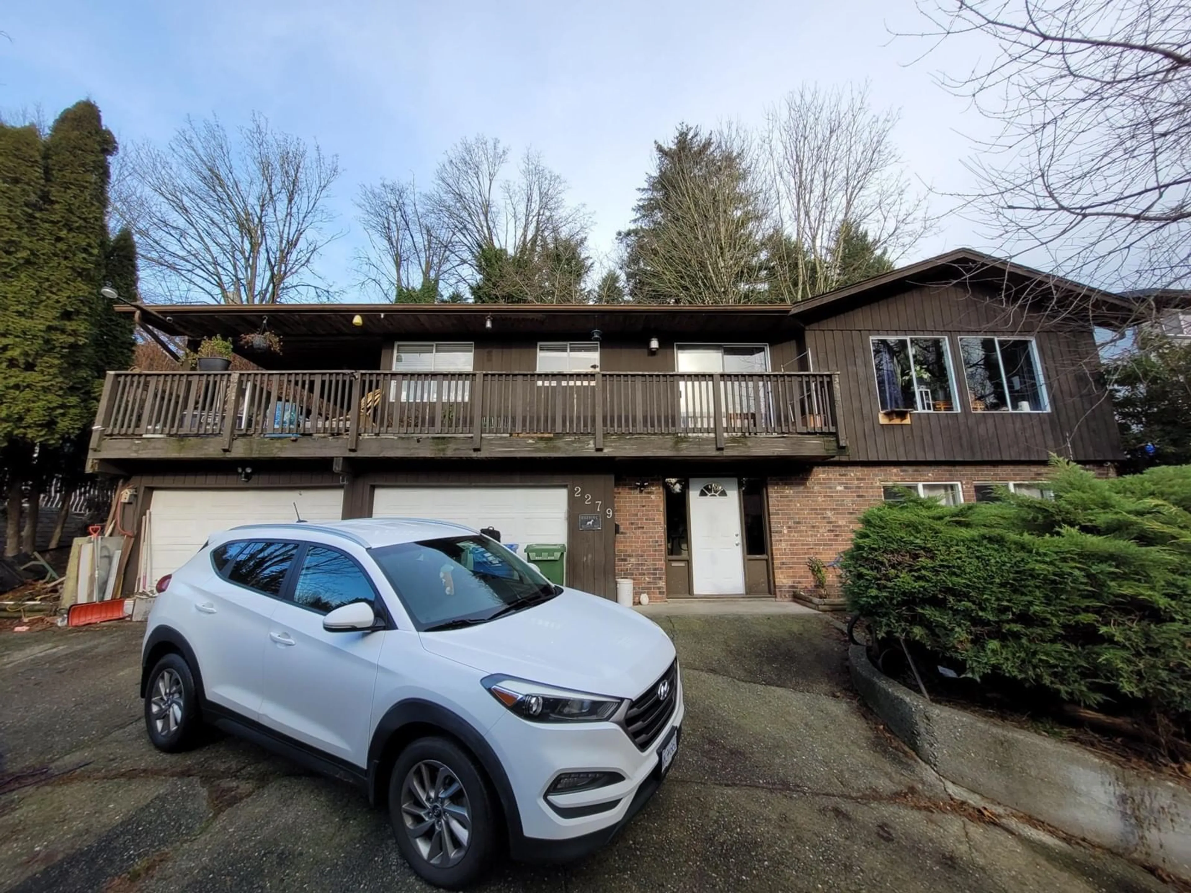 A pic from outside/outdoor area/front of a property/back of a property/a pic from drone, street for 2279 SENTINEL DRIVE, Abbotsford British Columbia V2S5C9