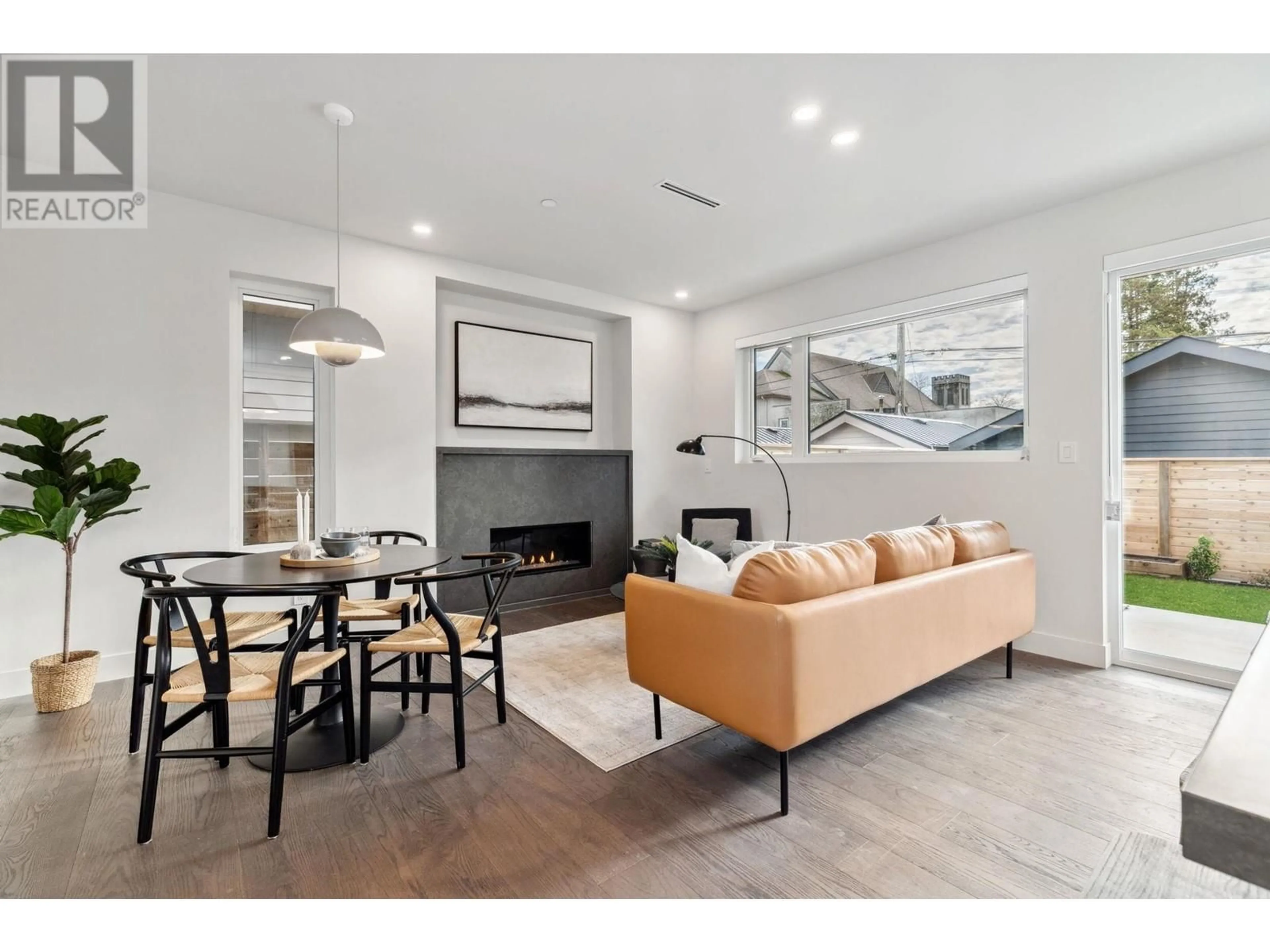 Living room with furniture, ceramic/tile floor for 2 620 E 46TH AVENUE, Vancouver British Columbia V5W2A3