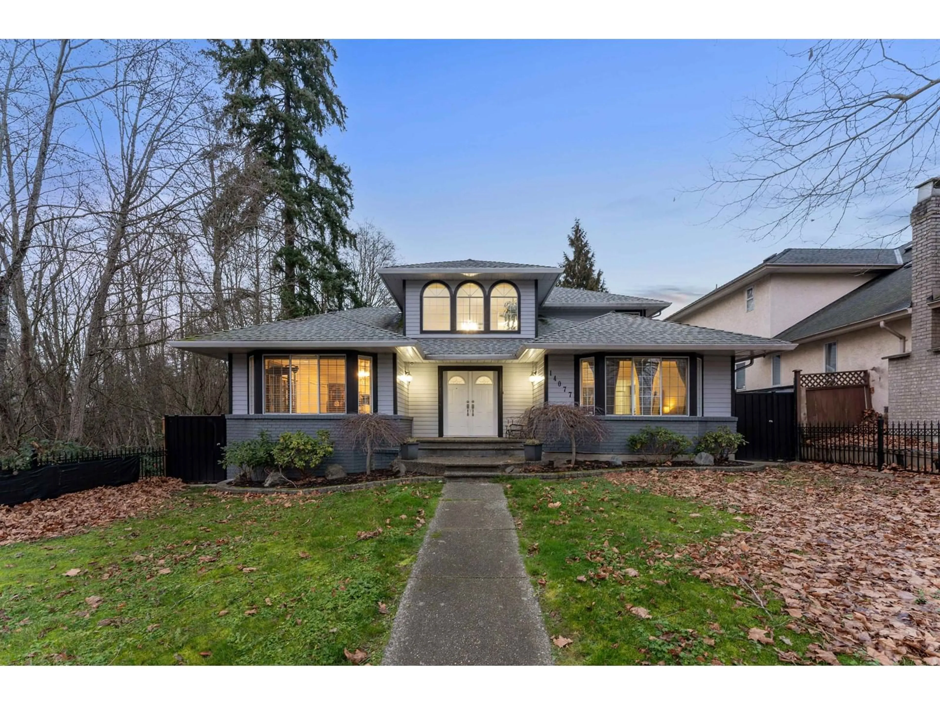 Home with vinyl exterior material, street for 14077 84TH, Surrey British Columbia V3W0V5