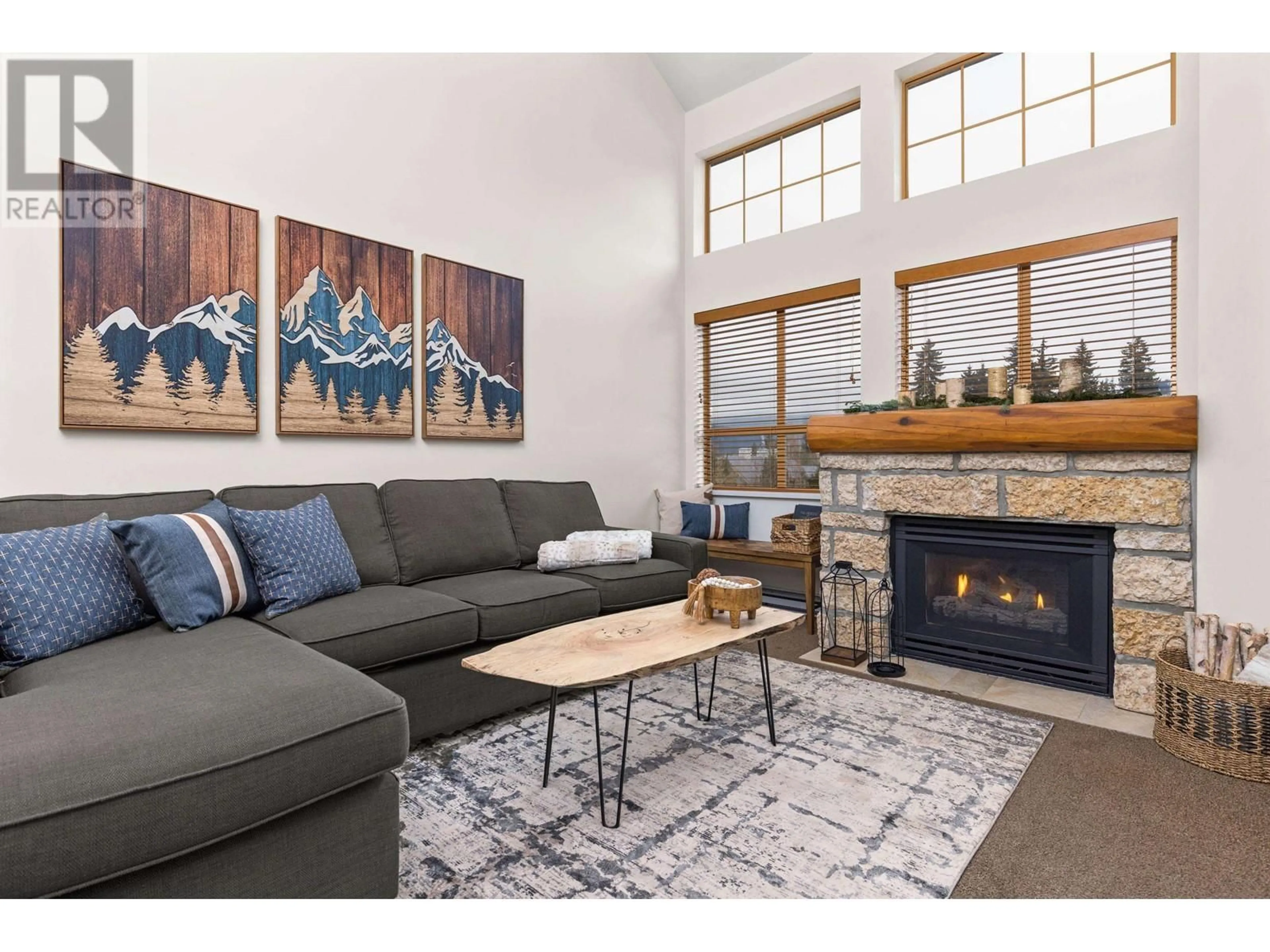 Living room with furniture, wood/laminate floor for 312 4338 MAIN STREET, Whistler British Columbia V8E1B4