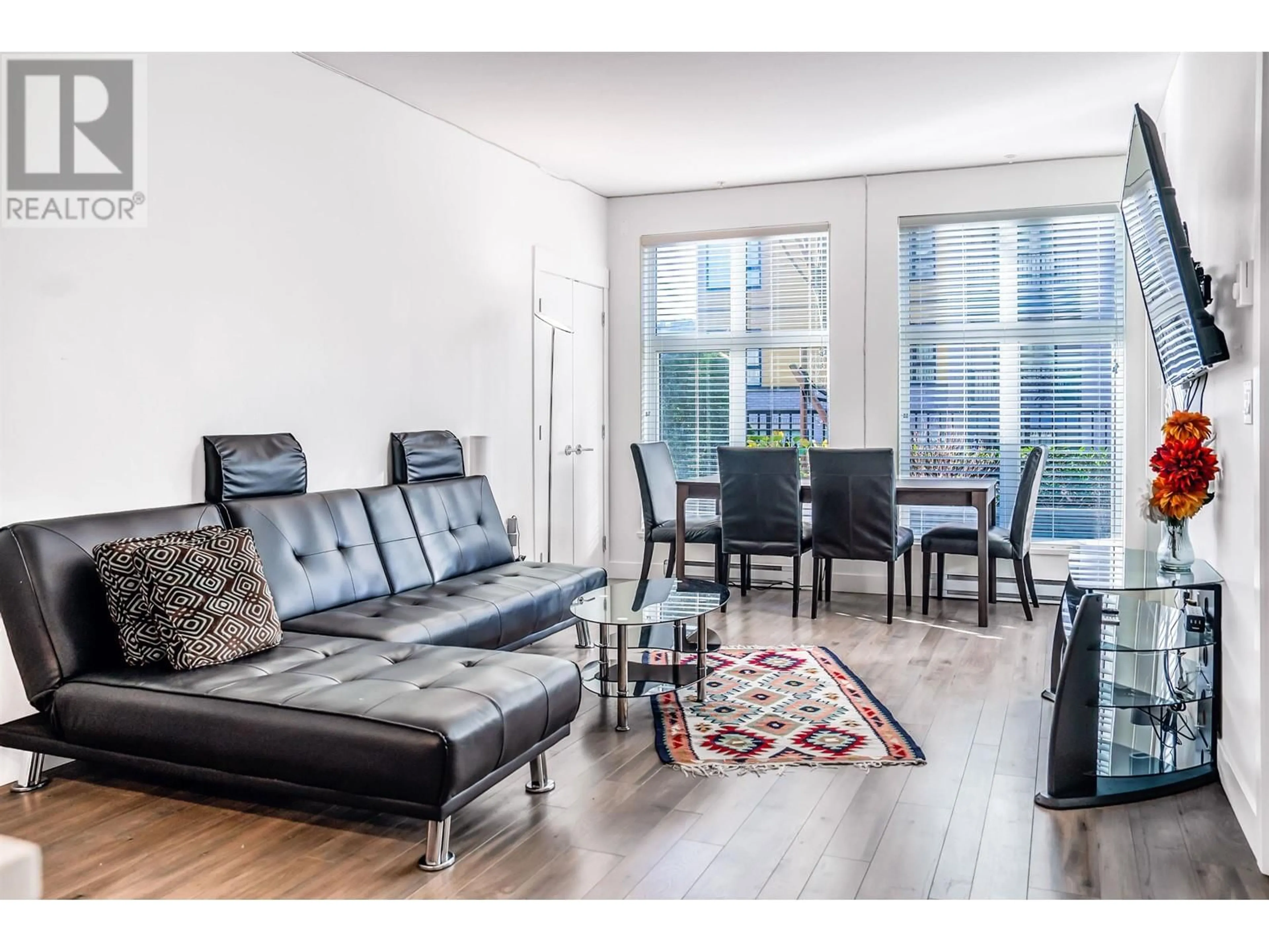 Living room with furniture, wood/laminate floor for 115 750 DOGWOOD STREET, Coquitlam British Columbia V3J4B7