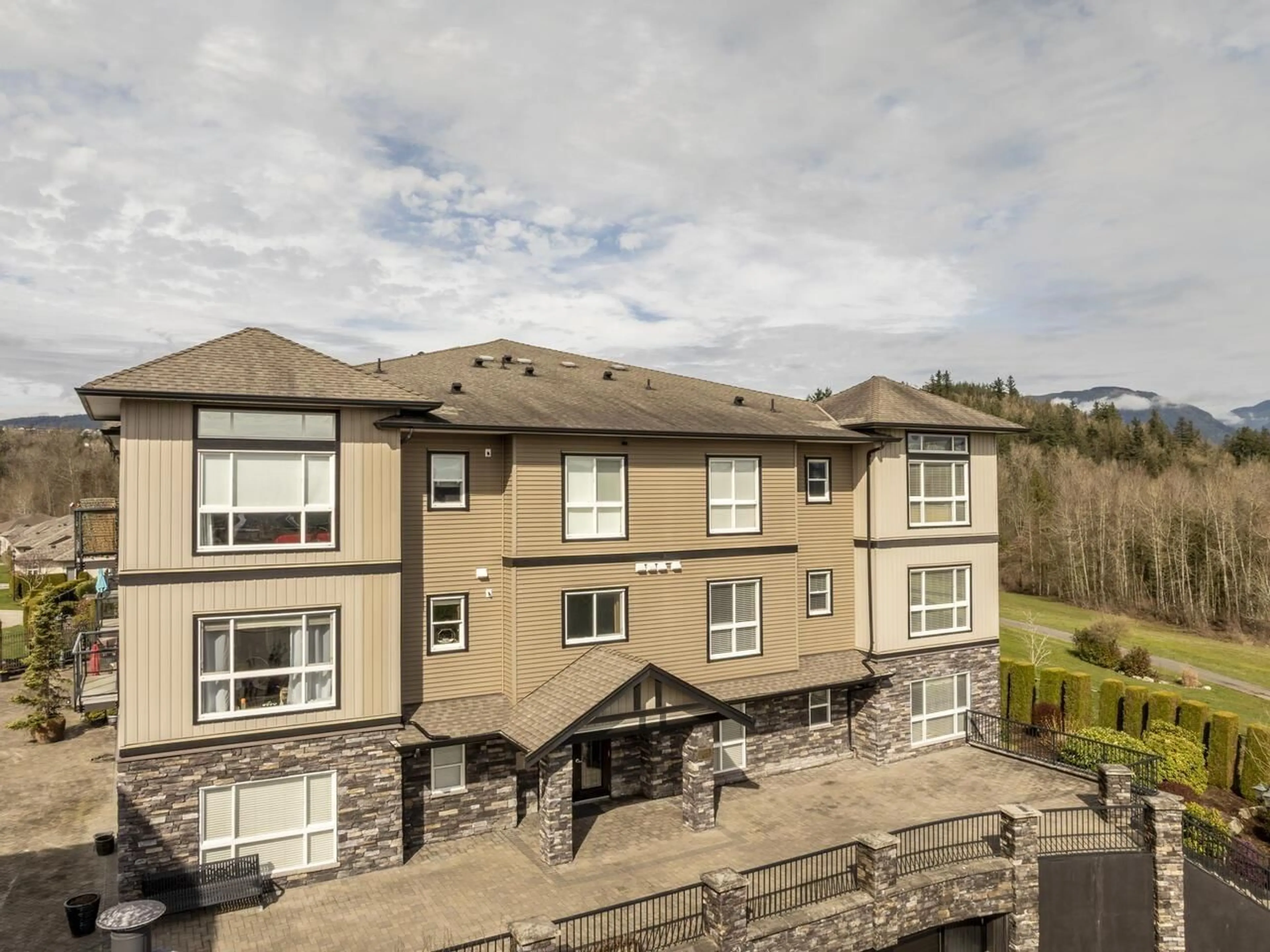 A pic from outside/outdoor area/front of a property/back of a property/a pic from drone, mountain view for B303 - 33755 7TH, Mission British Columbia V2V0A4
