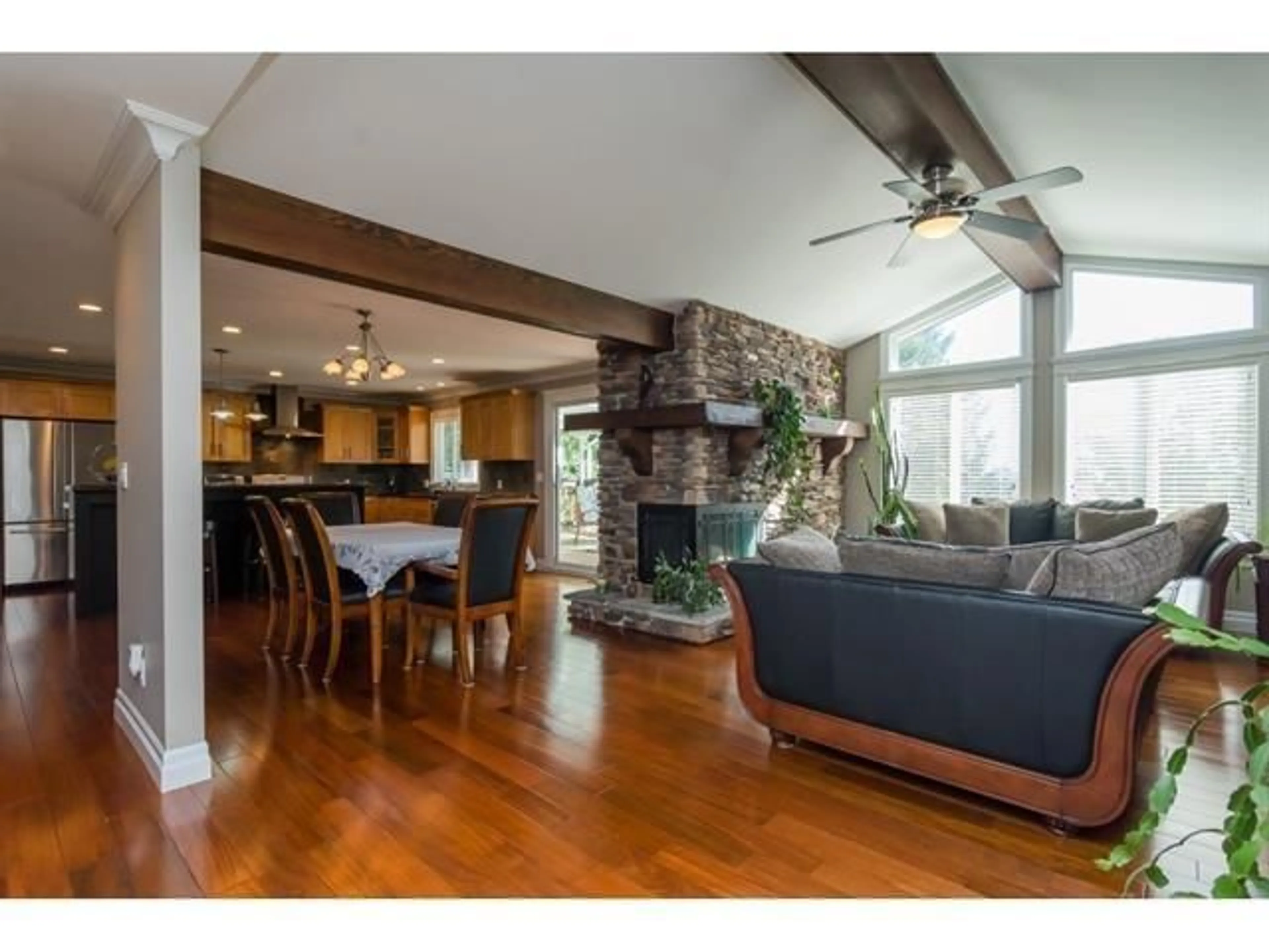 Open concept kitchen, wood/laminate floor for 17570 92 AVENUE, Surrey British Columbia V4N3G3