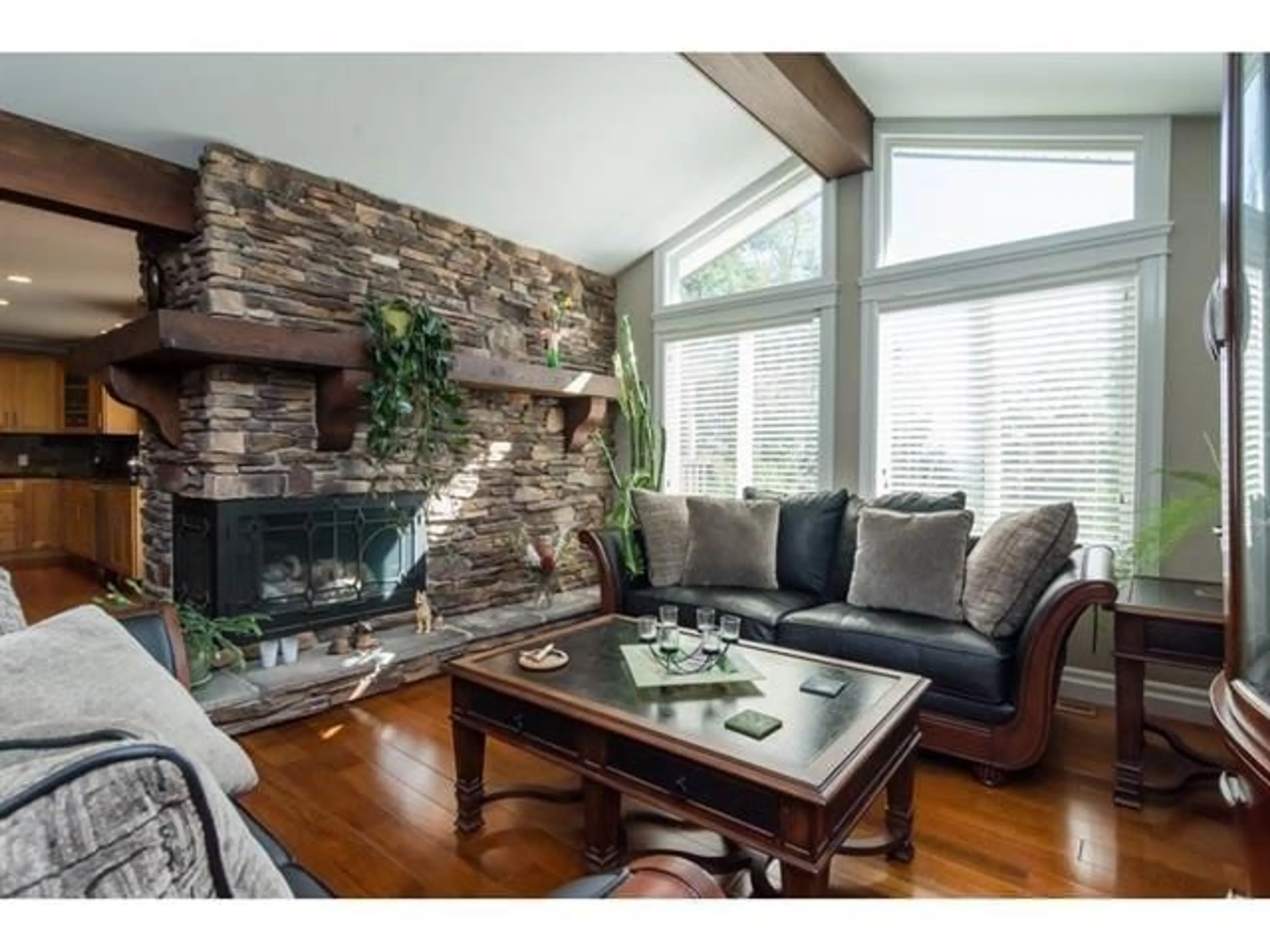 Living room with furniture, wood/laminate floor for 17570 92 AVENUE, Surrey British Columbia V4N3G3