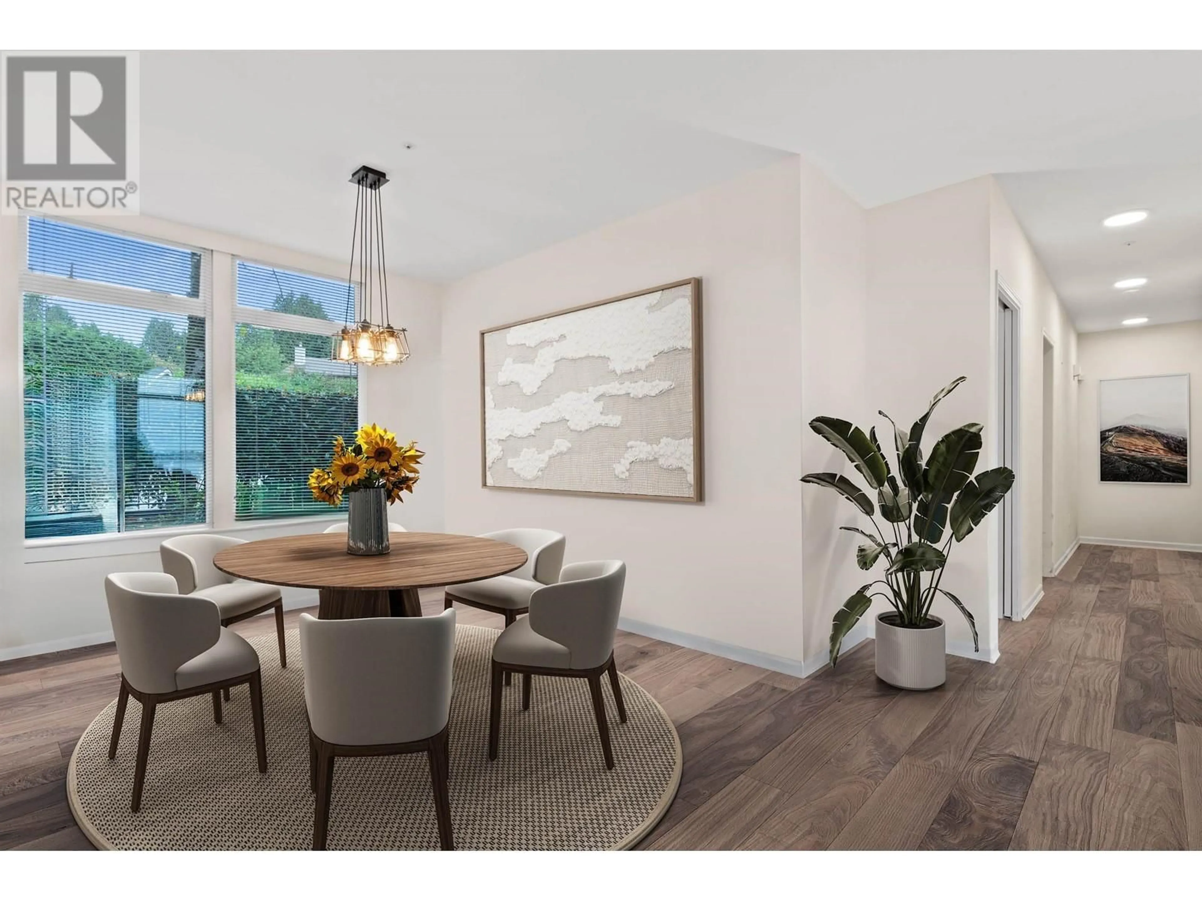 Dining room, wood/laminate floor for 309 2271 BELLEVUE AVENUE, West Vancouver British Columbia V7V4X1