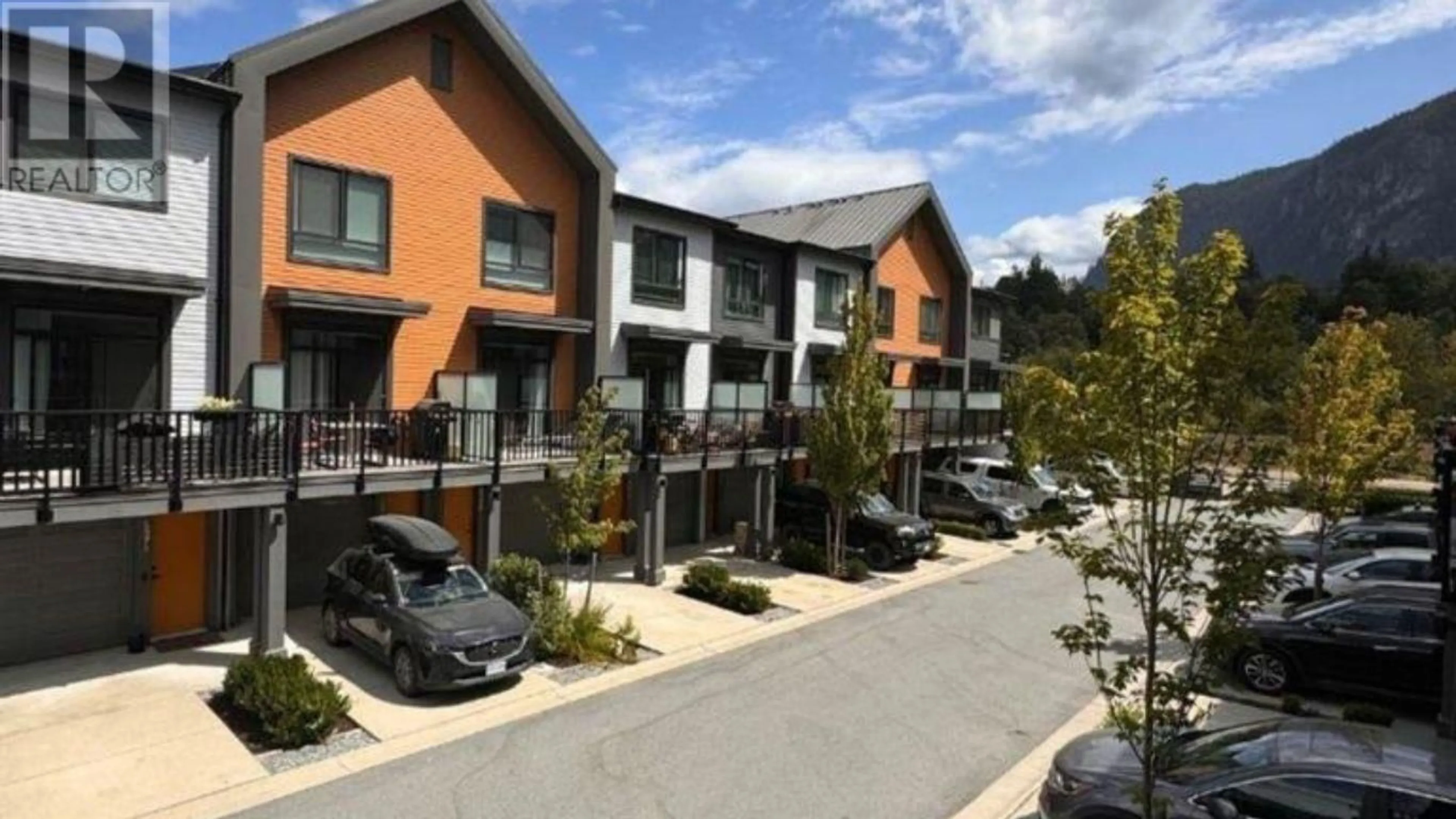 A pic from outside/outdoor area/front of a property/back of a property/a pic from drone, street for 1372 MARINASIDE PLACE, Squamish British Columbia V8B1A8