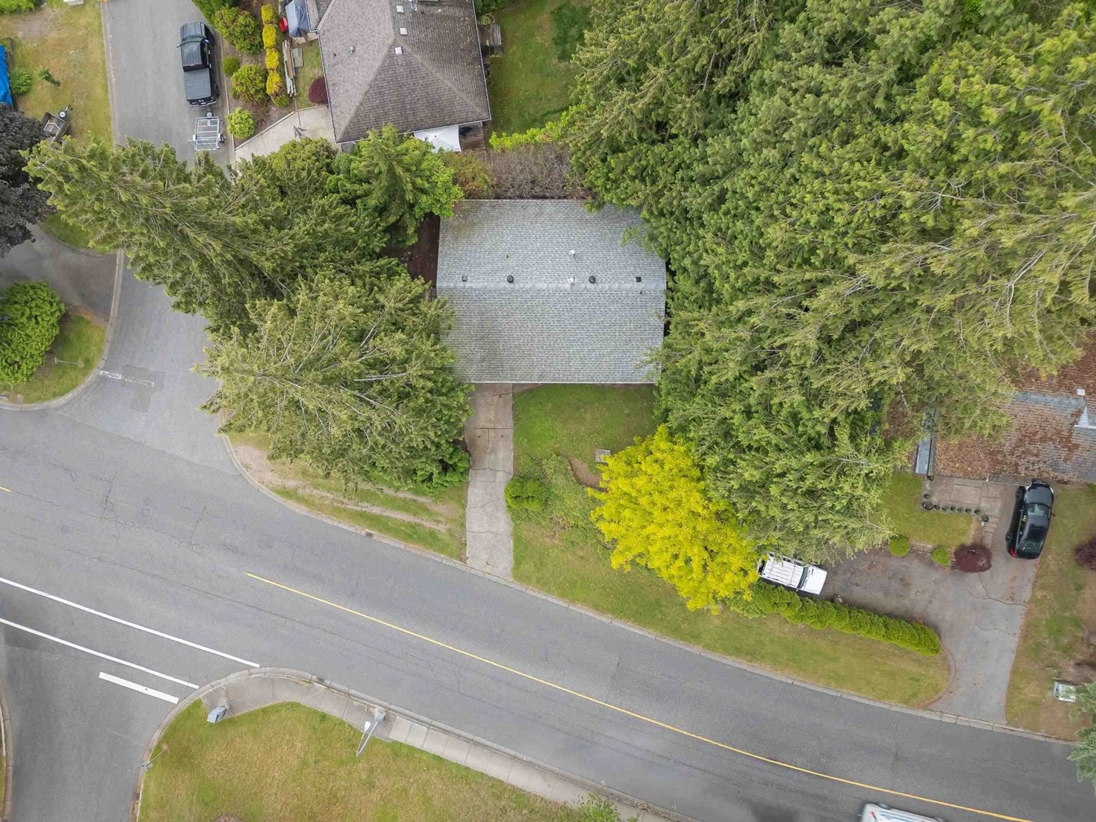 A pic from outside/outdoor area/front of a property/back of a property/a pic from drone, forest/trees view for 8061 CARIBOU STREET, Mission British Columbia V2V5R1