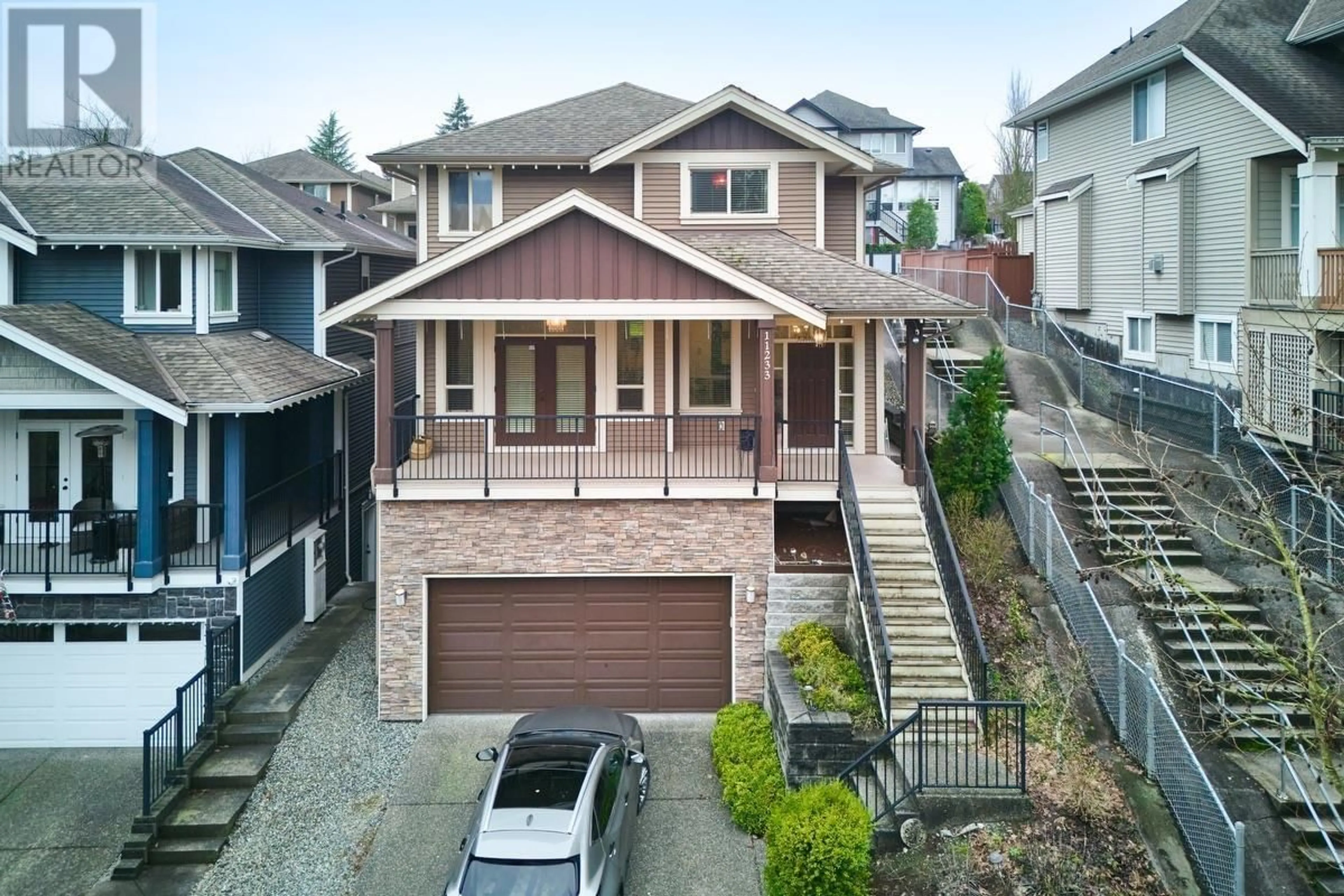 A pic from outside/outdoor area/front of a property/back of a property/a pic from drone, street for 11233 CREEKSIDE STREET, Maple Ridge British Columbia V2W0E8