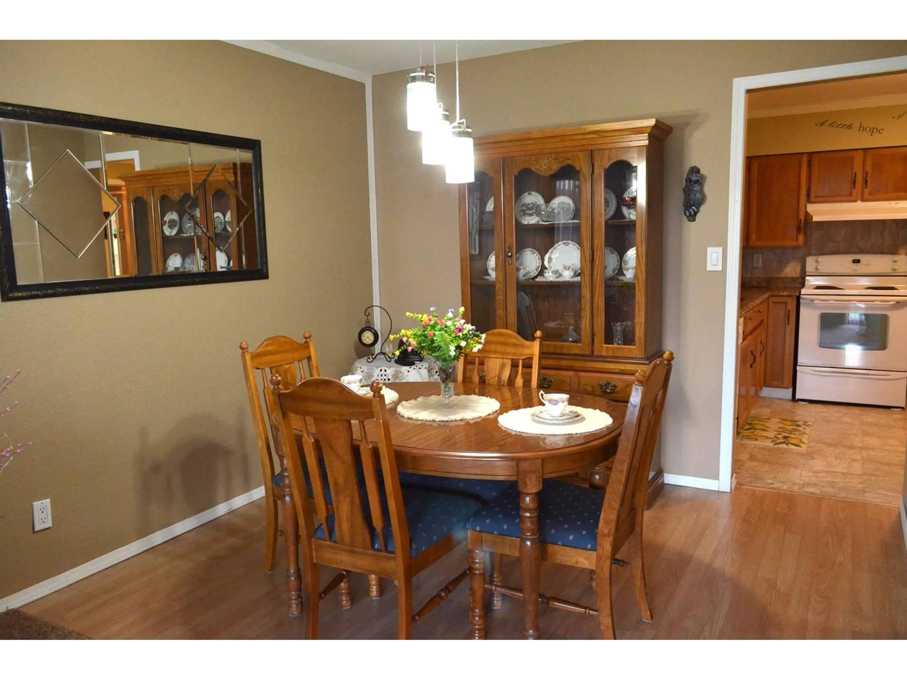 Dining room, wood/laminate floor for 208 32040 TIMS AVENUE, Abbotsford British Columbia V2T2H2