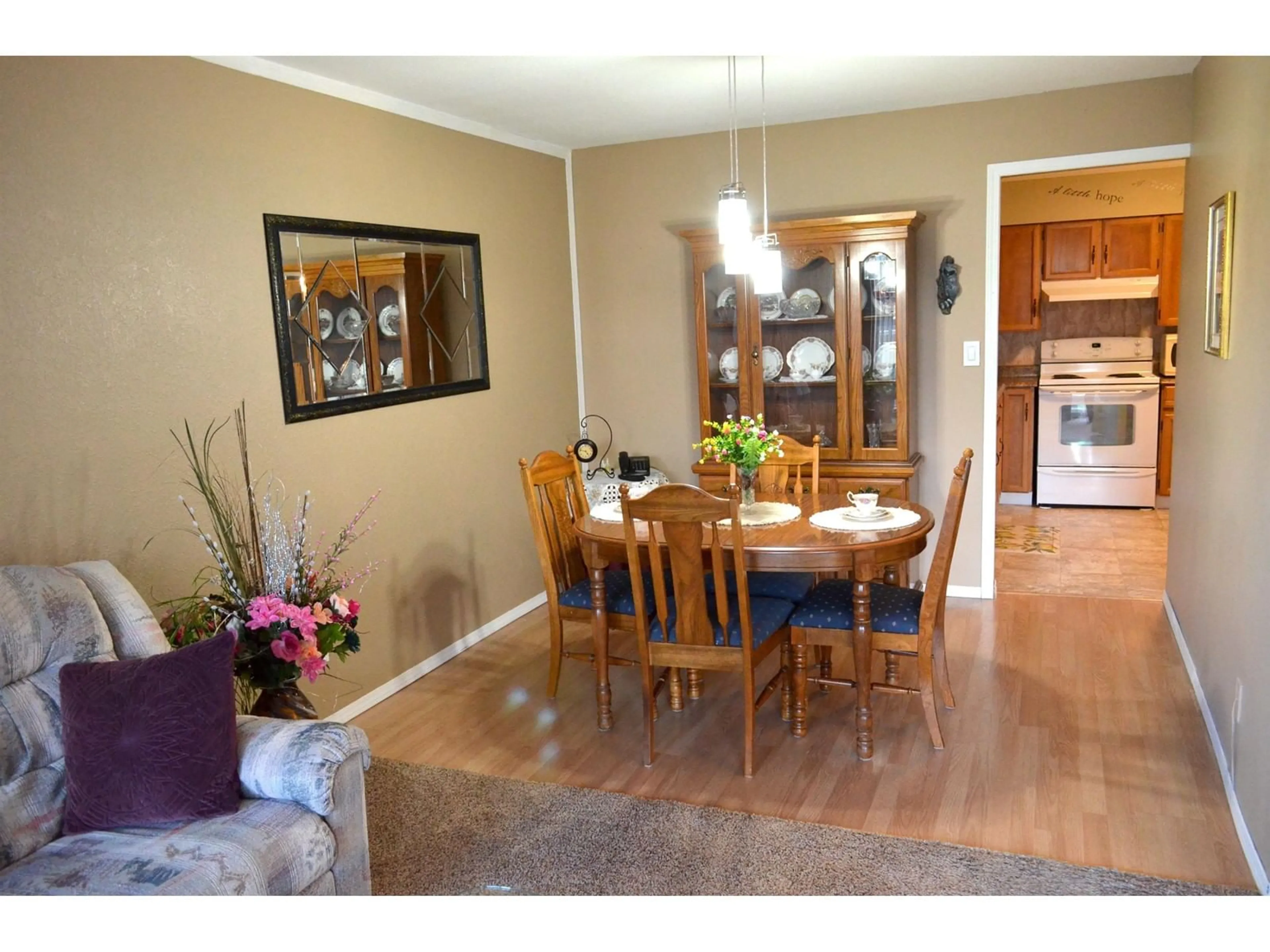 Dining room, wood/laminate floor for 208 32040 TIMS AVENUE, Abbotsford British Columbia V2T2H2