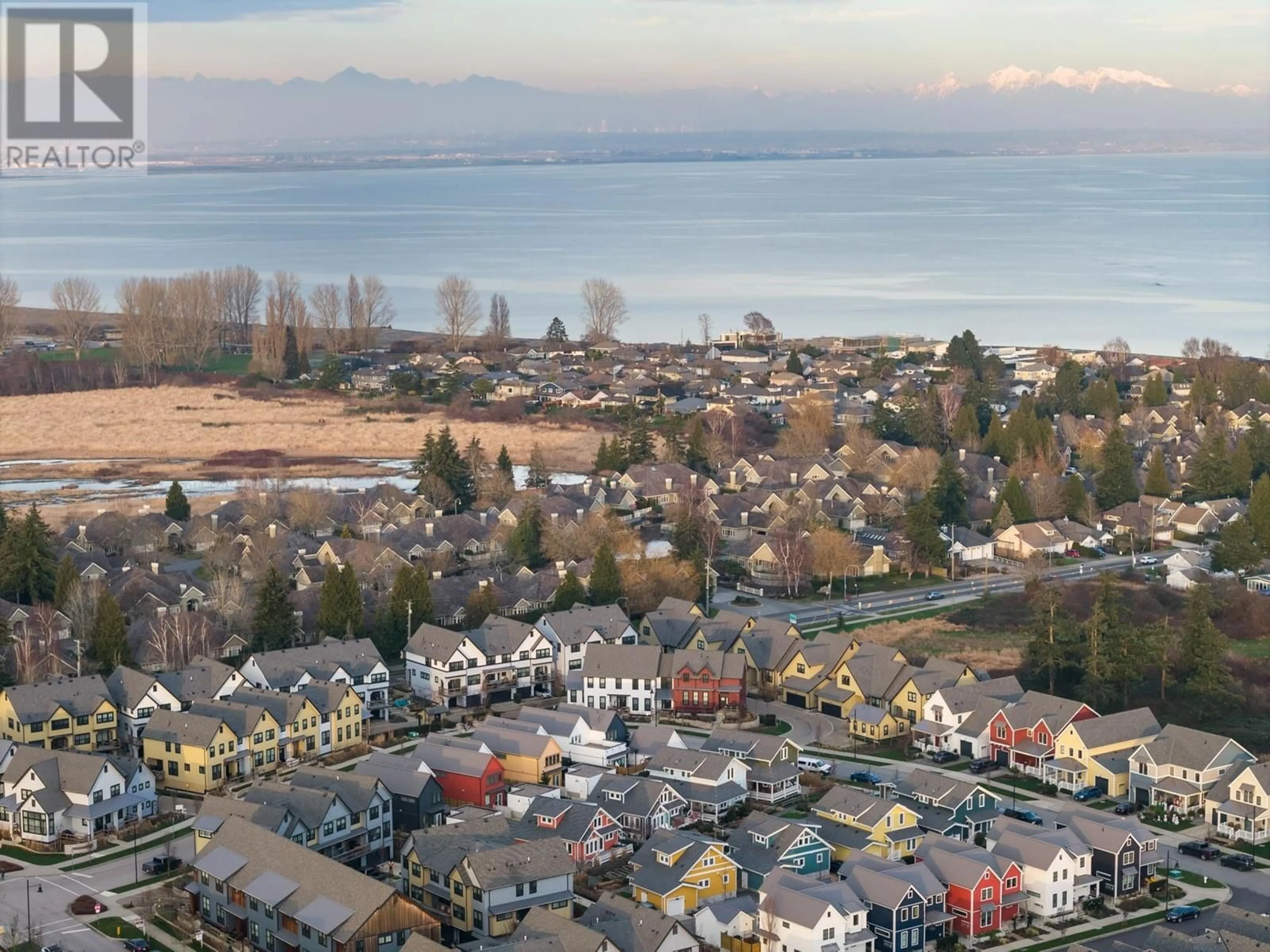 A pic from outside/outdoor area/front of a property/back of a property/a pic from drone, mountain view for 1 263 PARKSIDE STREET, Tsawwassen British Columbia V4L0A9