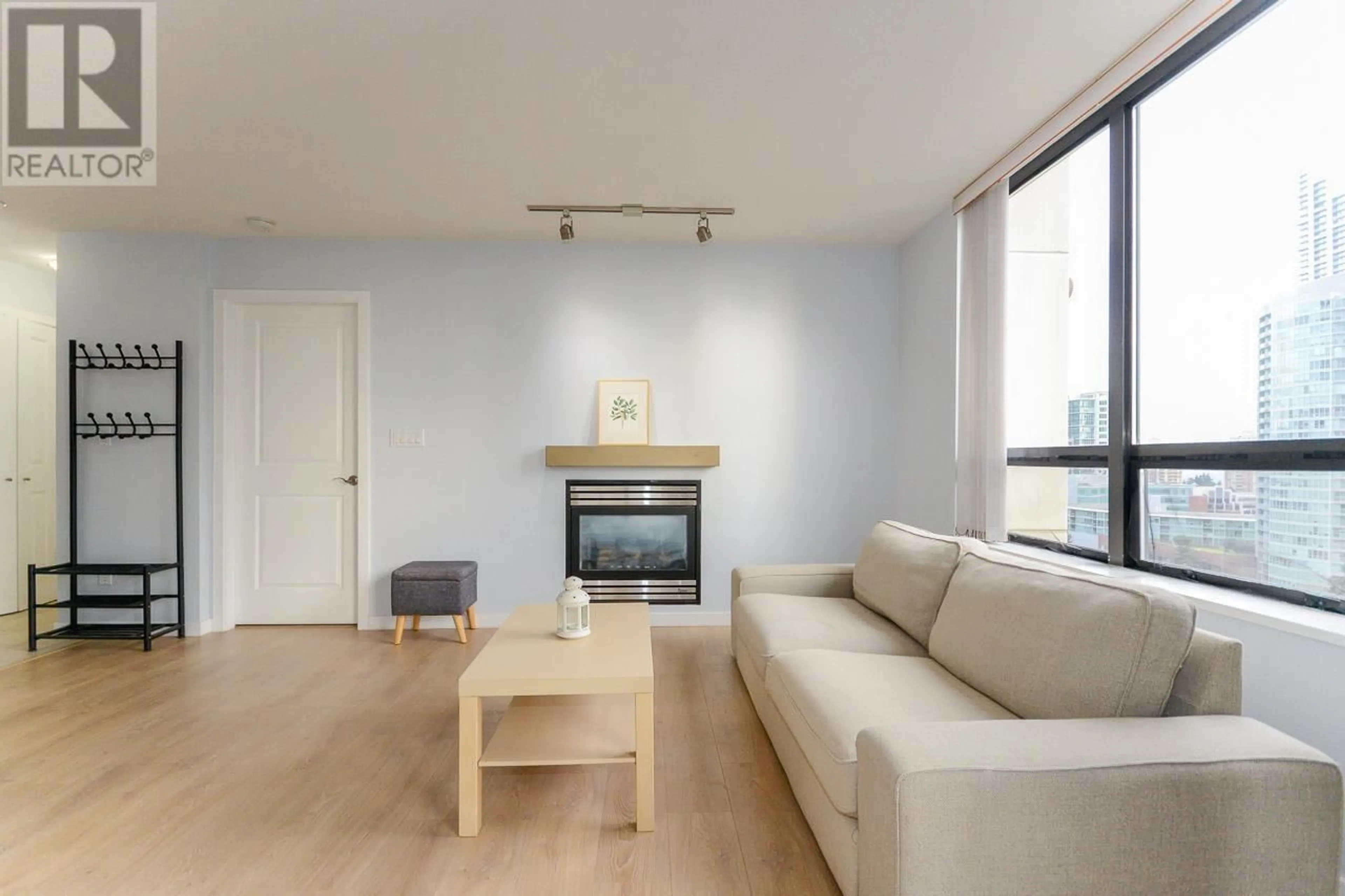 Living room with furniture, wood/laminate floor for 1402 4333 CENTRAL BOULEVARD, Burnaby British Columbia V5H4W8