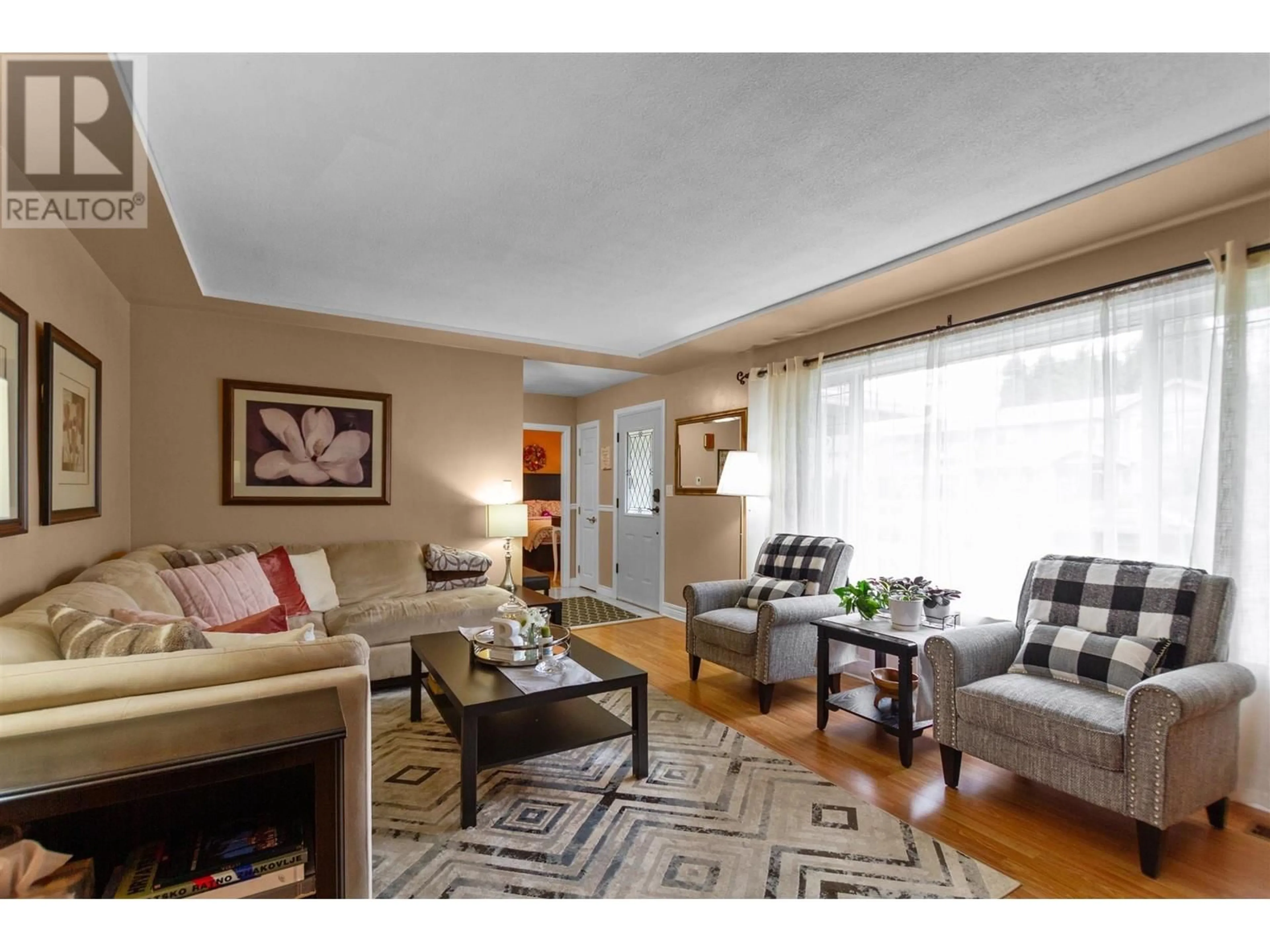 Living room with furniture, wood/laminate floor for 1418 DANSEY AVENUE, Coquitlam British Columbia V3K3H8