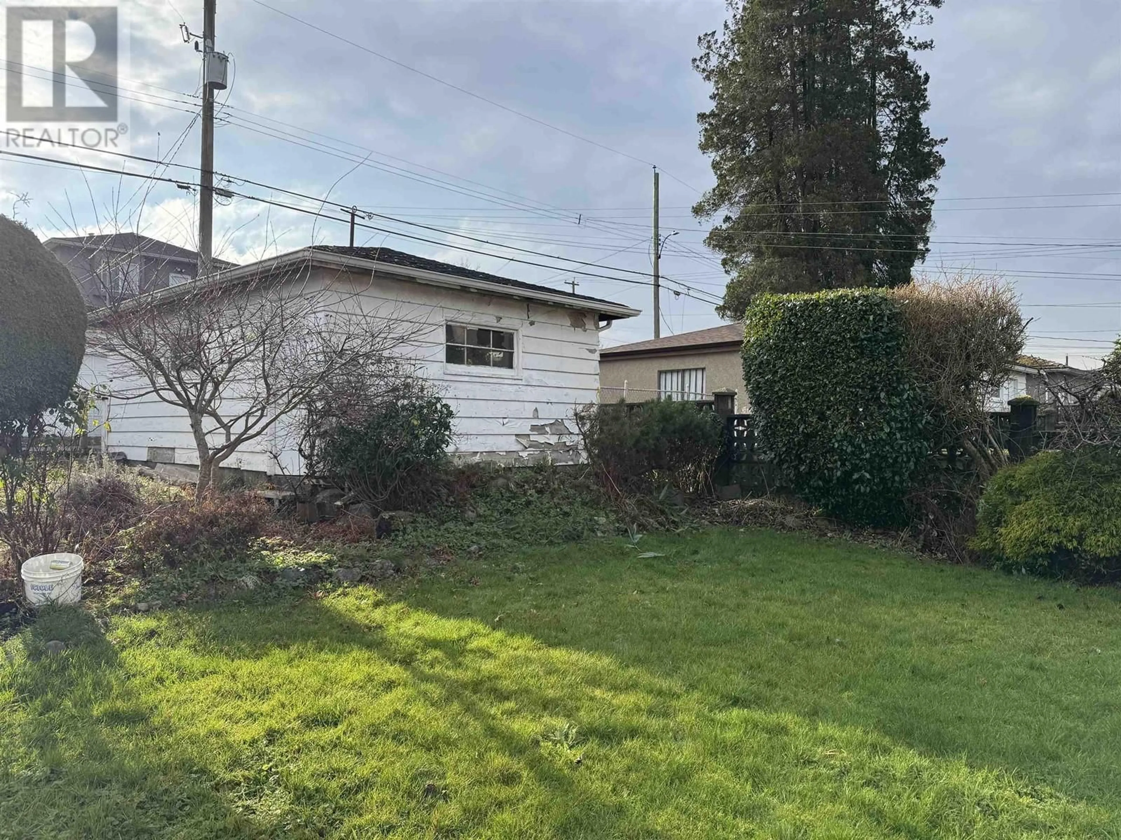 A pic from outside/outdoor area/front of a property/back of a property/a pic from drone, street for 2730 E 3RD AVENUE, Vancouver British Columbia V5M1H4