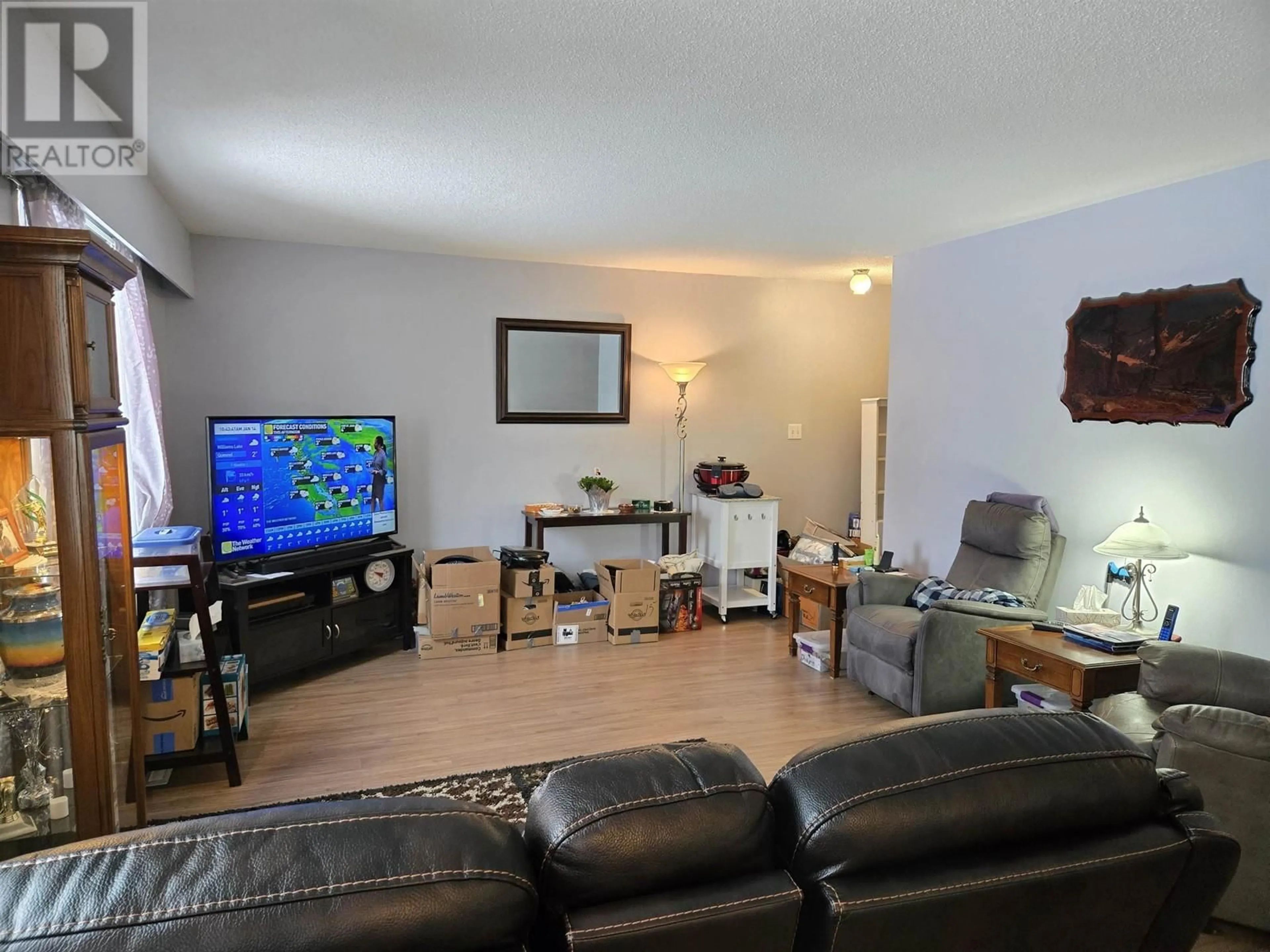 Living room with furniture, wood/laminate floor for 159 MCLEAN DRIVE, Prince George British Columbia V2M4R5