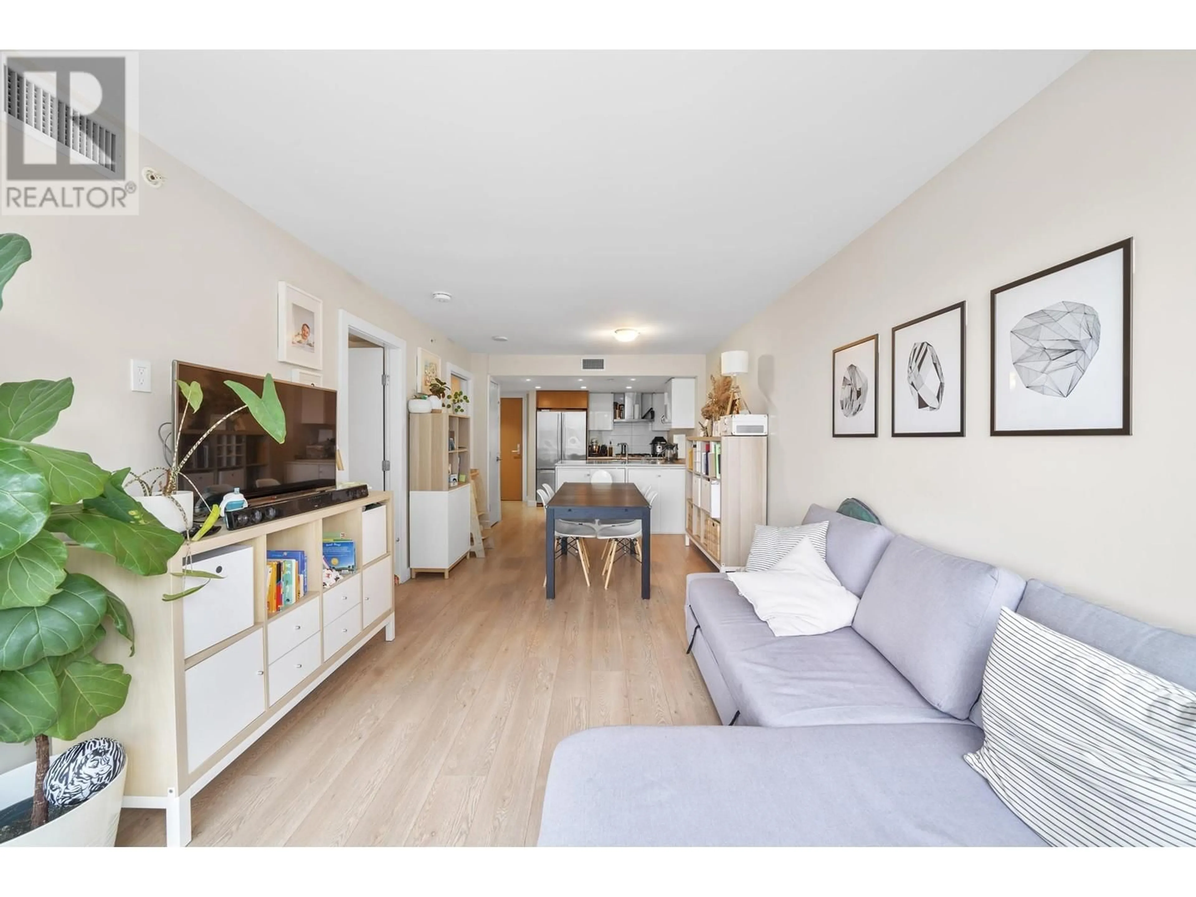 Living room with furniture, wood/laminate floor for 711 1618 QUEBEC STREET, Vancouver British Columbia V6A0C5