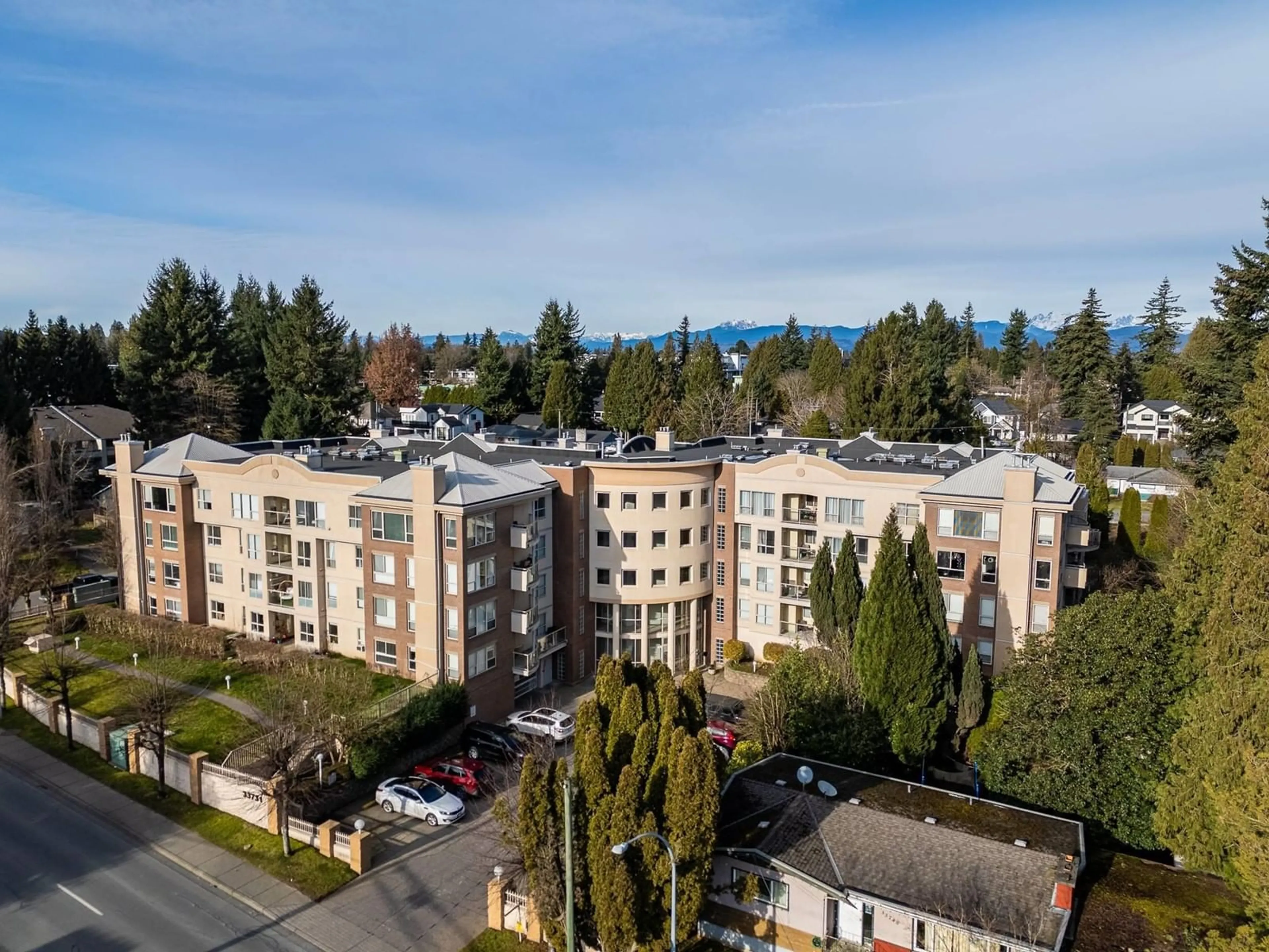 A pic from outside/outdoor area/front of a property/back of a property/a pic from drone, unknown for 103 - 33731 MARSHALL, Abbotsford British Columbia V2S1L5