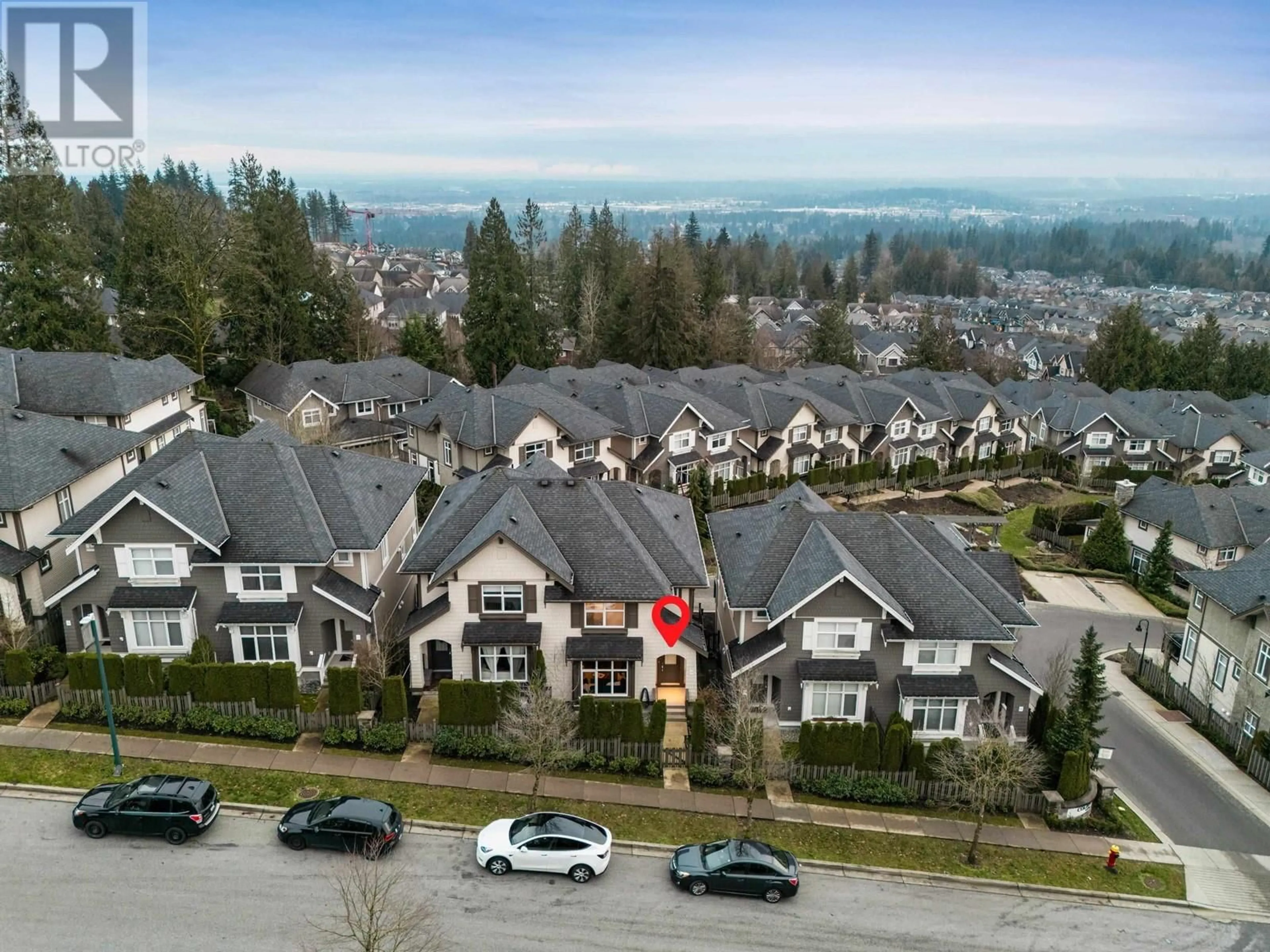 A pic from outside/outdoor area/front of a property/back of a property/a pic from drone, mountain view for 64 3400 DEVONSHIRE AVENUE, Coquitlam British Columbia V3E0L1