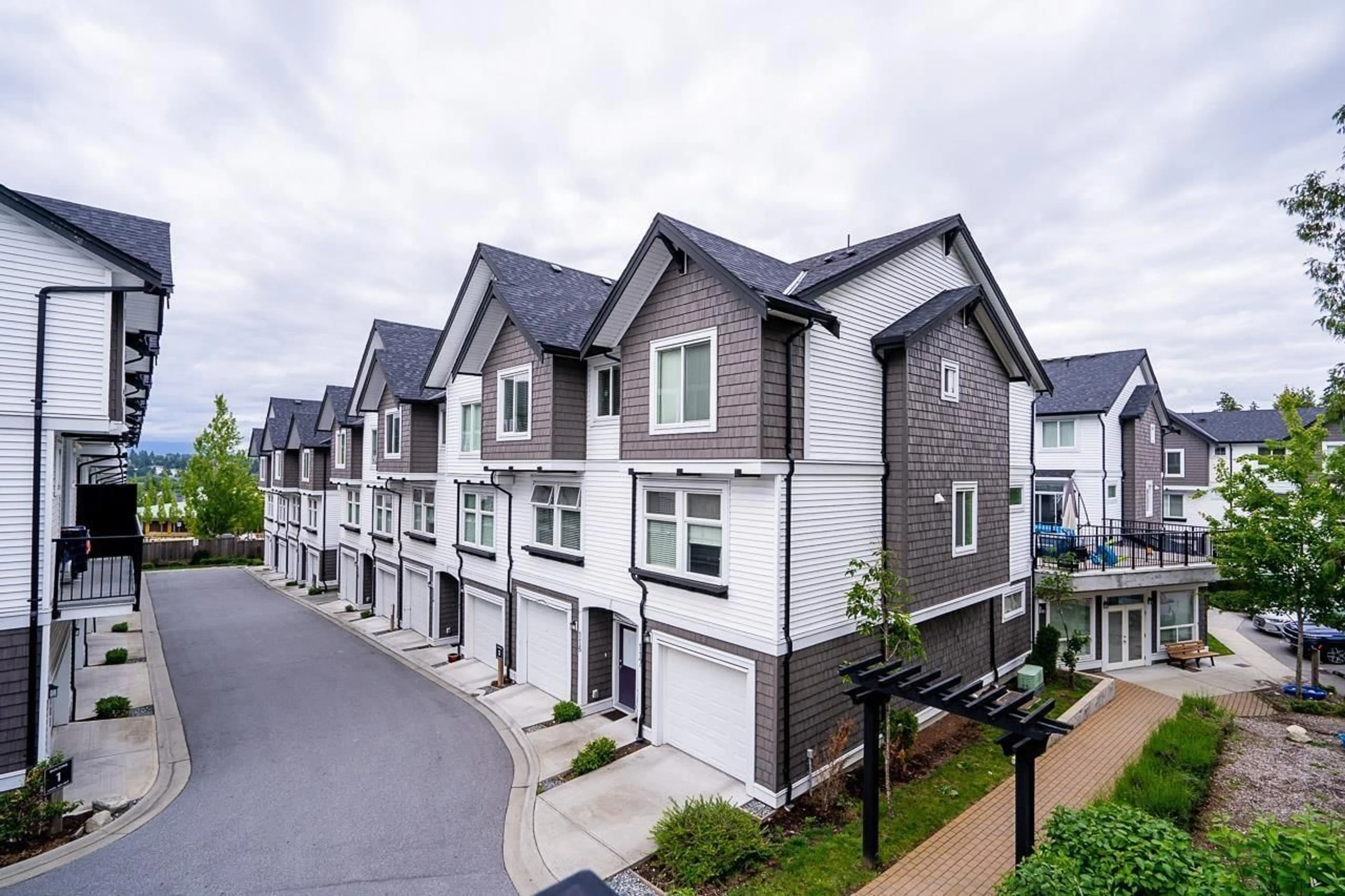 A pic from outside/outdoor area/front of a property/back of a property/a pic from drone, street for 148 - 6030 142, Surrey British Columbia V3X0J5
