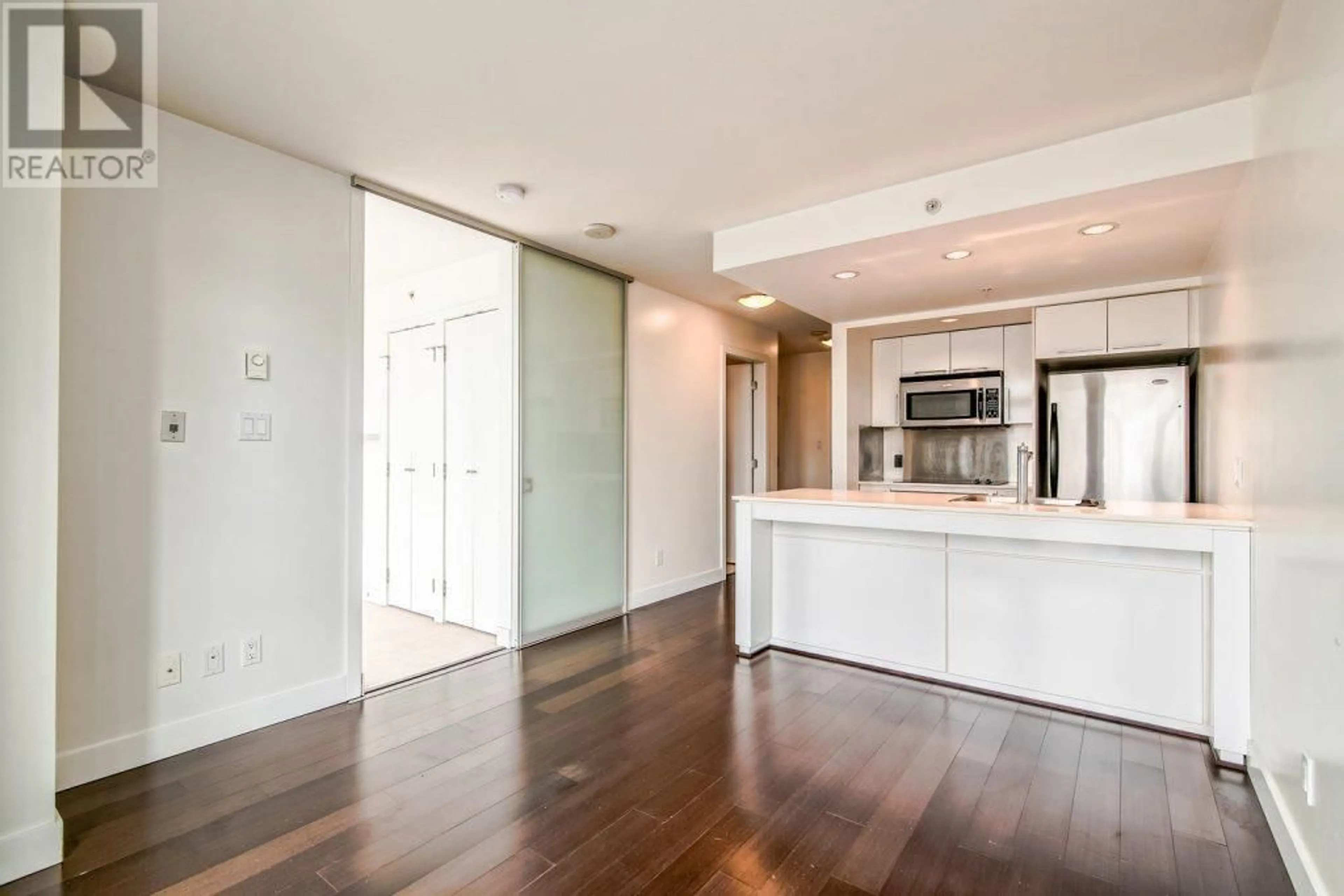 Open concept kitchen, wood/laminate floor for 2104 1255 SEYMOUR STREET, Vancouver British Columbia V6B0H1