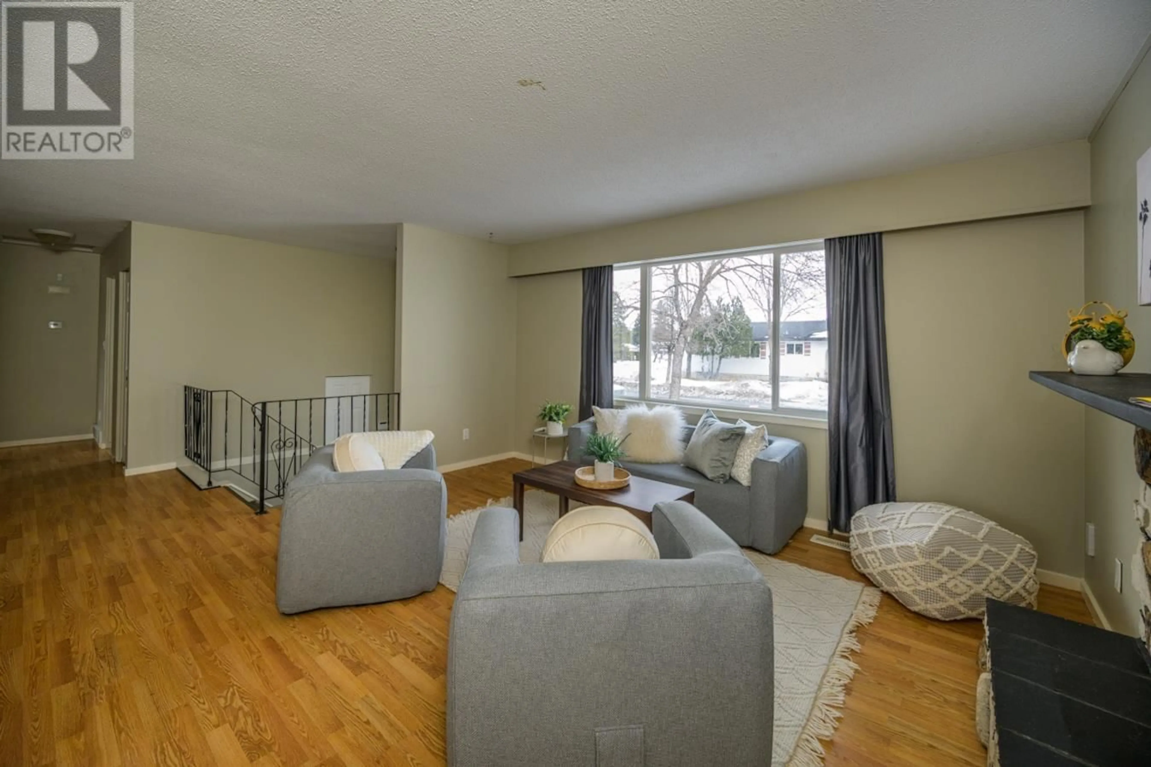 Living room with furniture, wood/laminate floor for 717 LACOMA STREET, Prince George British Columbia V2M5G4