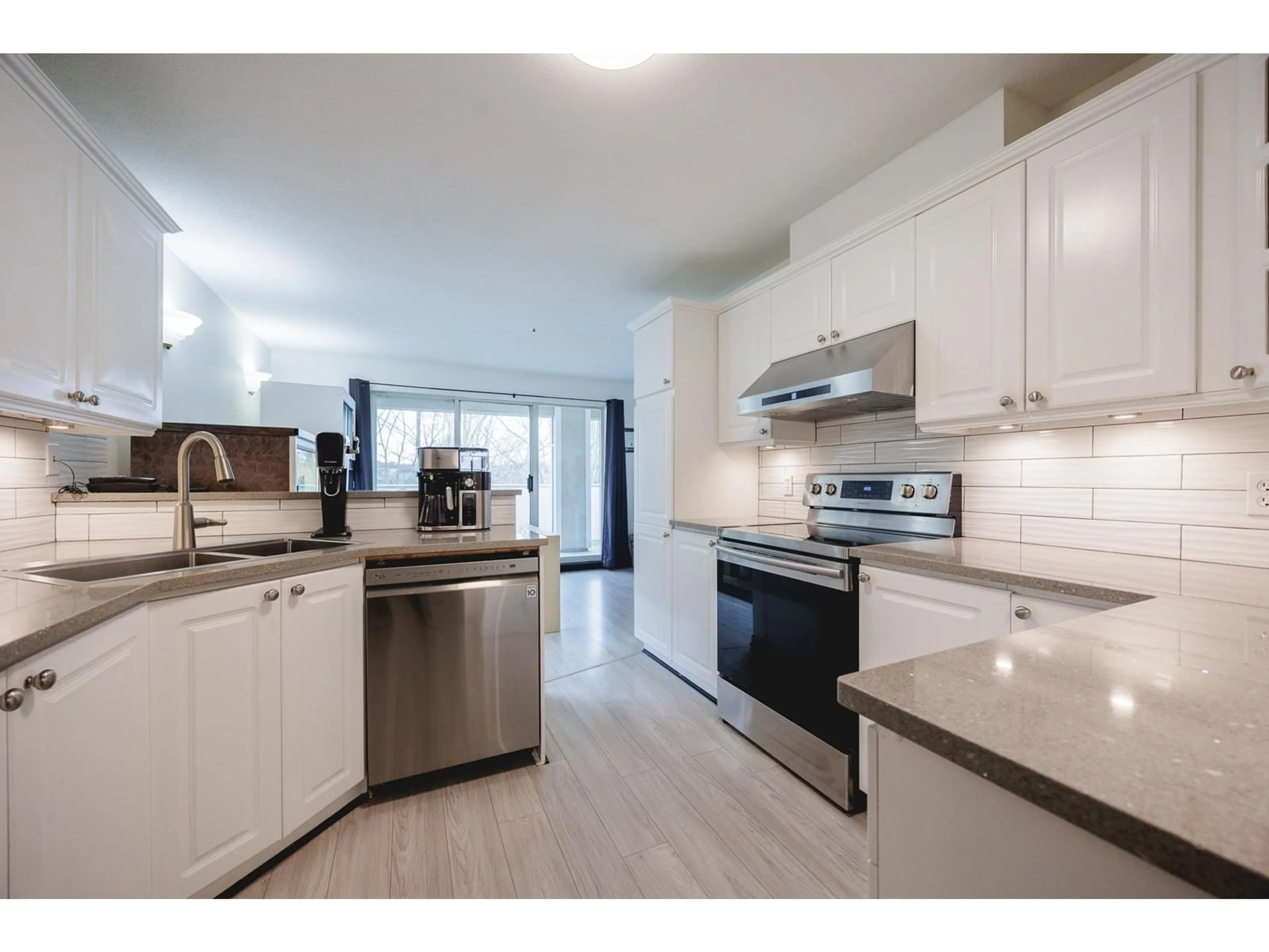 Open concept kitchen, unknown for 303 20145 55A AVENUE, Langley British Columbia V3A8L6