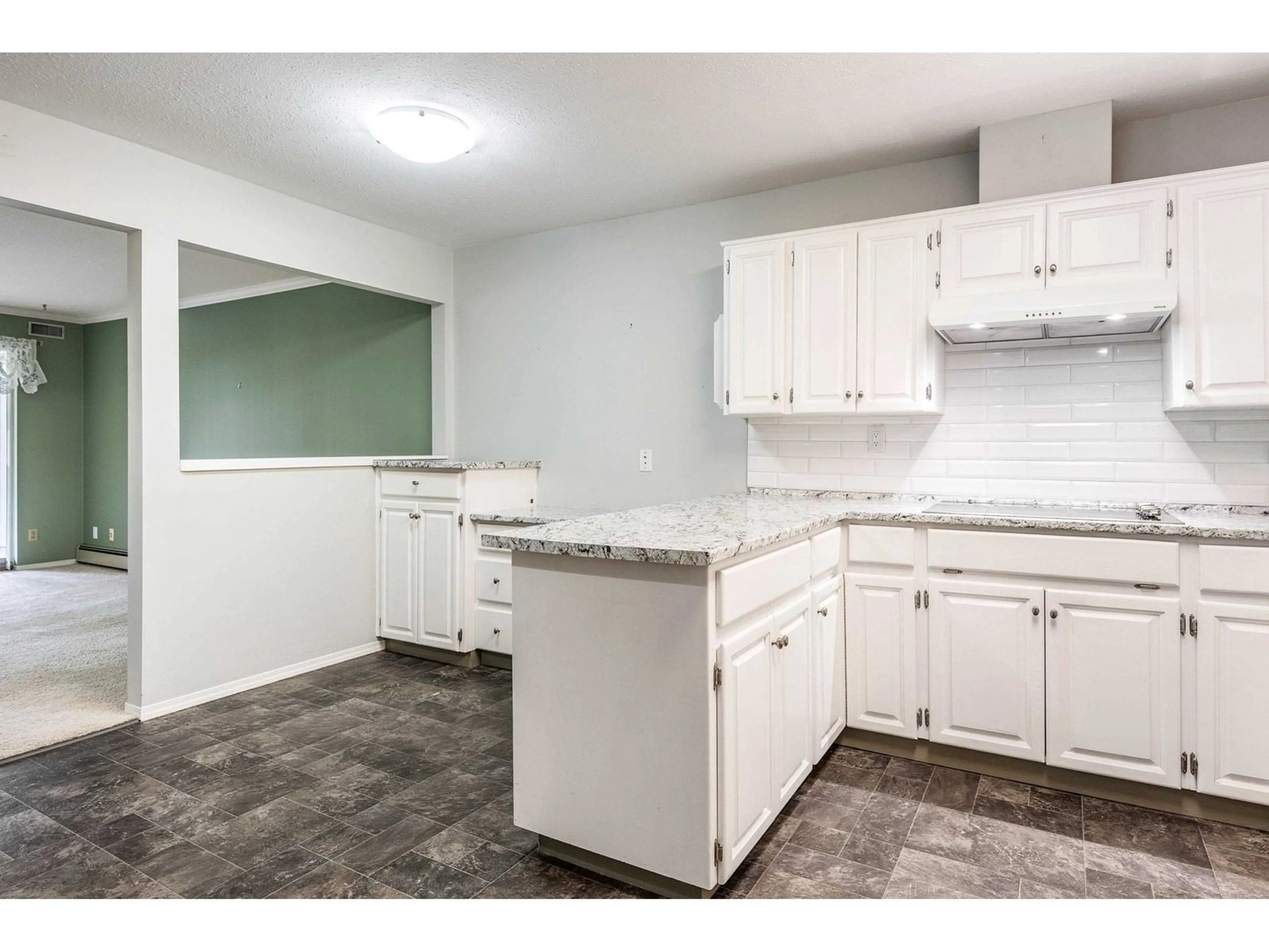 Standard kitchen, ceramic/tile floor for 208 2451 GLADWIN ROAD, Abbotsford British Columbia V2T3N8