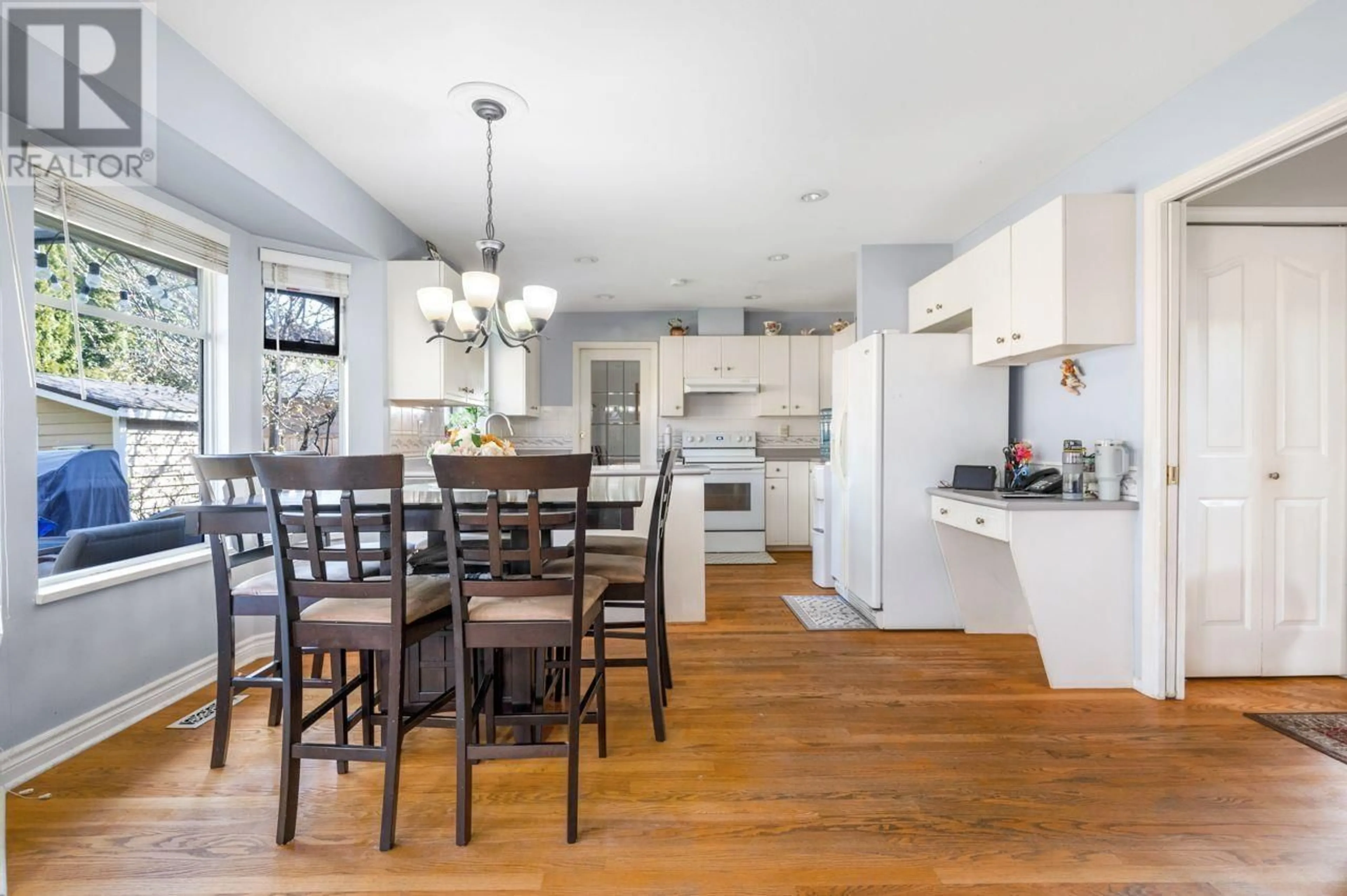 Open concept kitchen, wood/laminate floor for 6315 48A AVENUE, Delta British Columbia V4K4W1