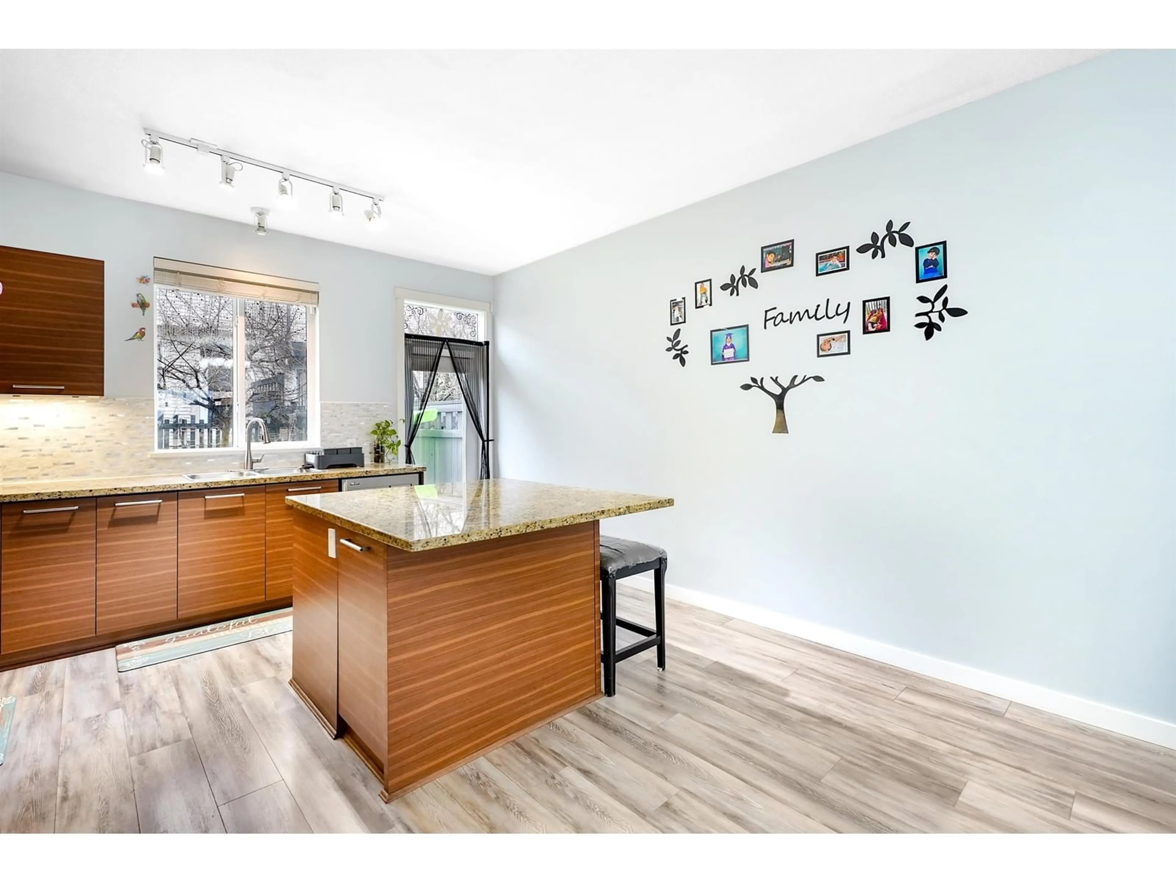 Open concept kitchen, wood/laminate floor for 87 7938 209 STREET, Langley British Columbia V2Y0K1