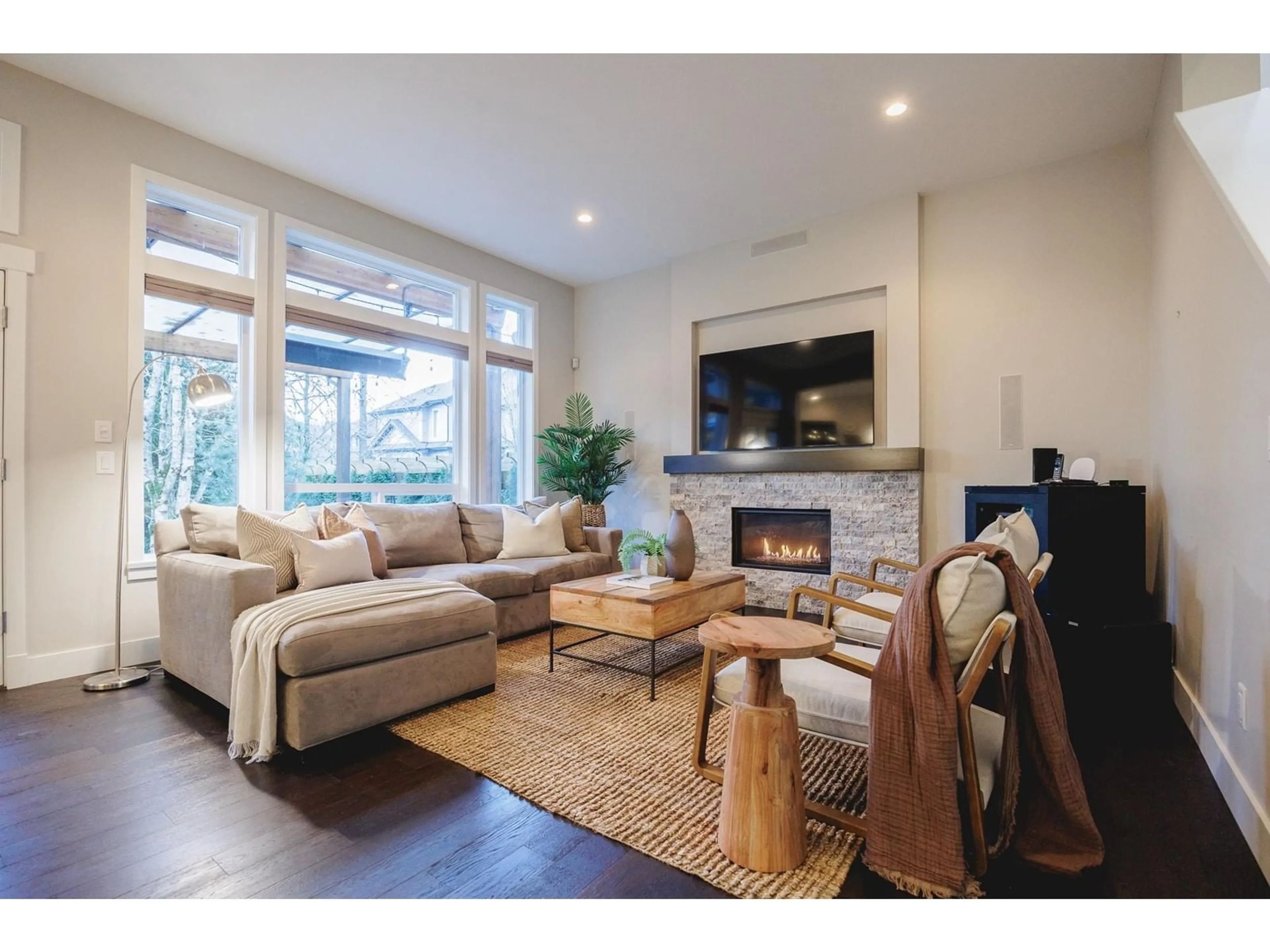 Living room with furniture, wood/laminate floor for 18055 67A AVENUE, Surrey British Columbia V3S7H7