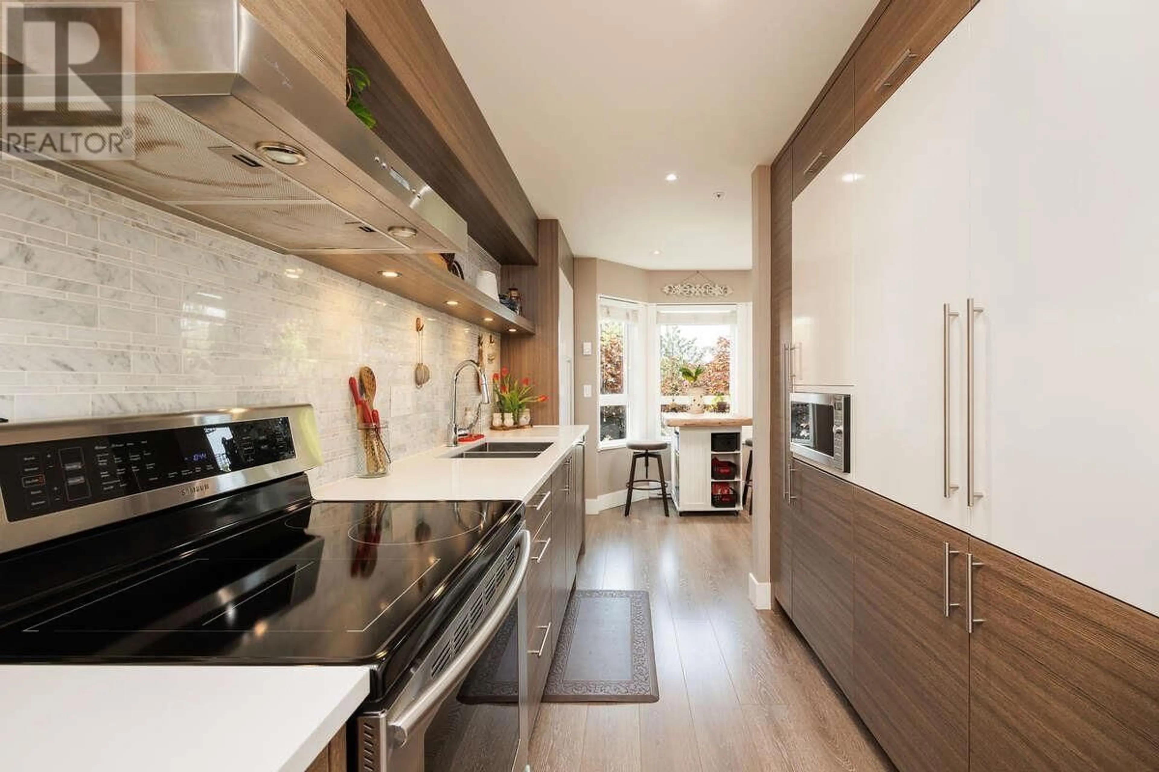 Contemporary kitchen, ceramic/tile floor for 202 - 2250 MARINE DRIVE, Vancouver British Columbia V5P2S2