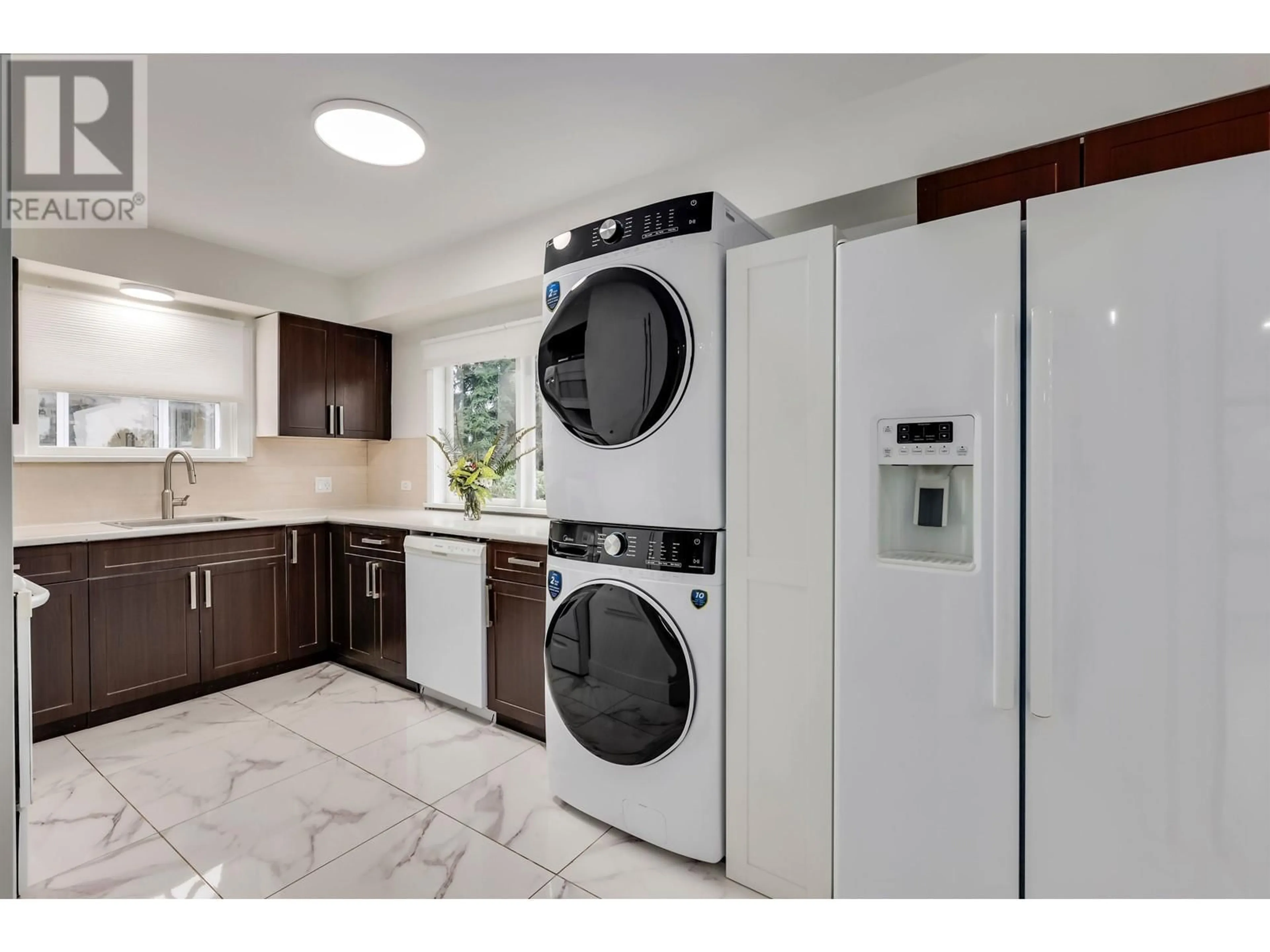 Kitchen with laundary machines, ceramic/tile floor for 181 WINDSOR ROAD, North Vancouver British Columbia V7N2M9