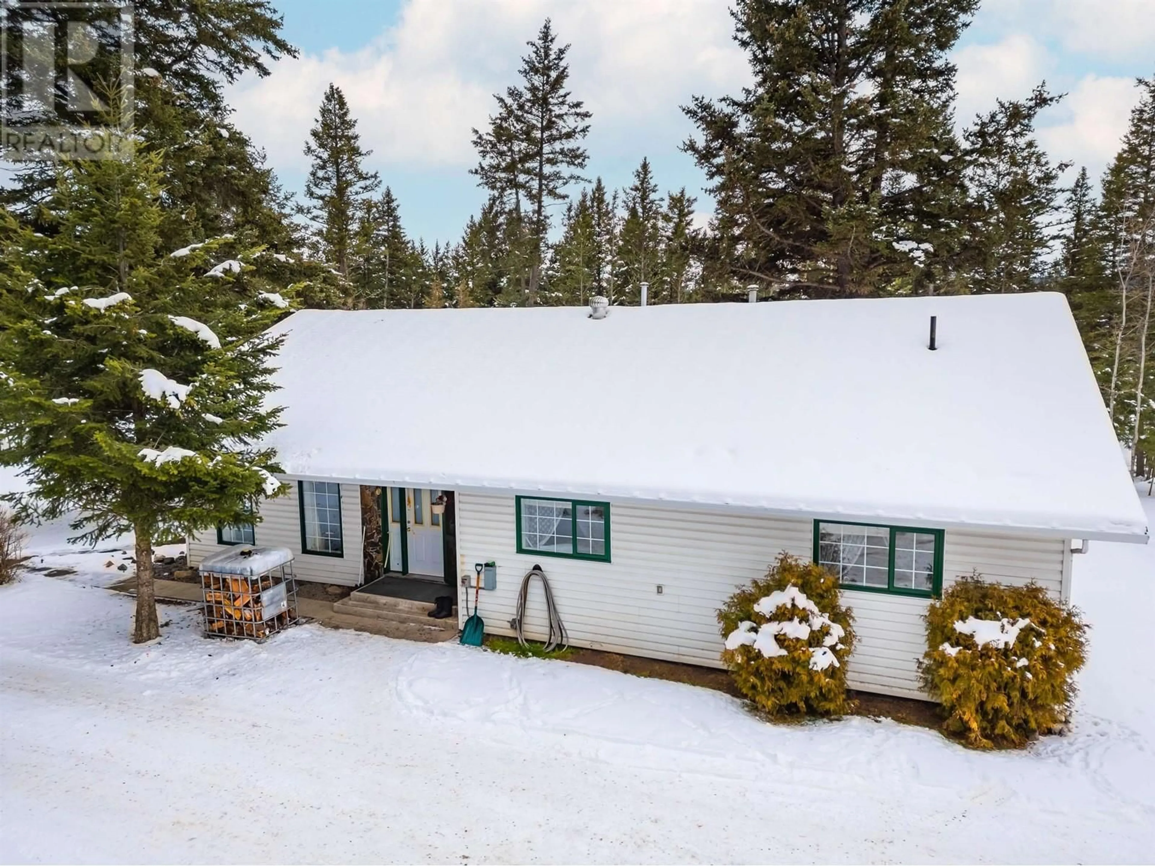 A pic from outside/outdoor area/front of a property/back of a property/a pic from drone, mountain view for 4457 FIRCREST ROAD, Lac La Hache British Columbia V0K1T1