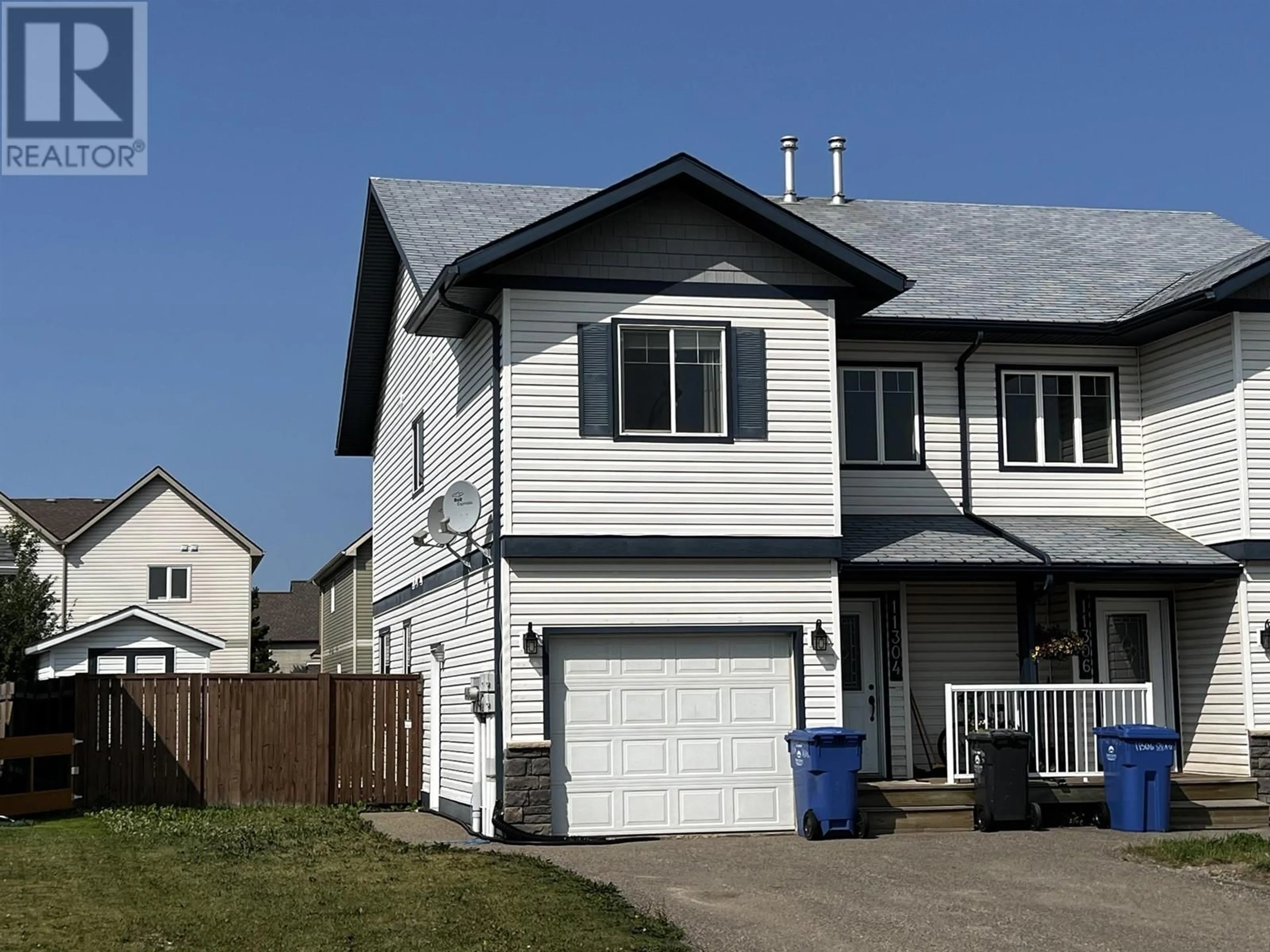 Home with vinyl exterior material, street for 11304 88A STREET, Fort St. John British Columbia V1J0C5