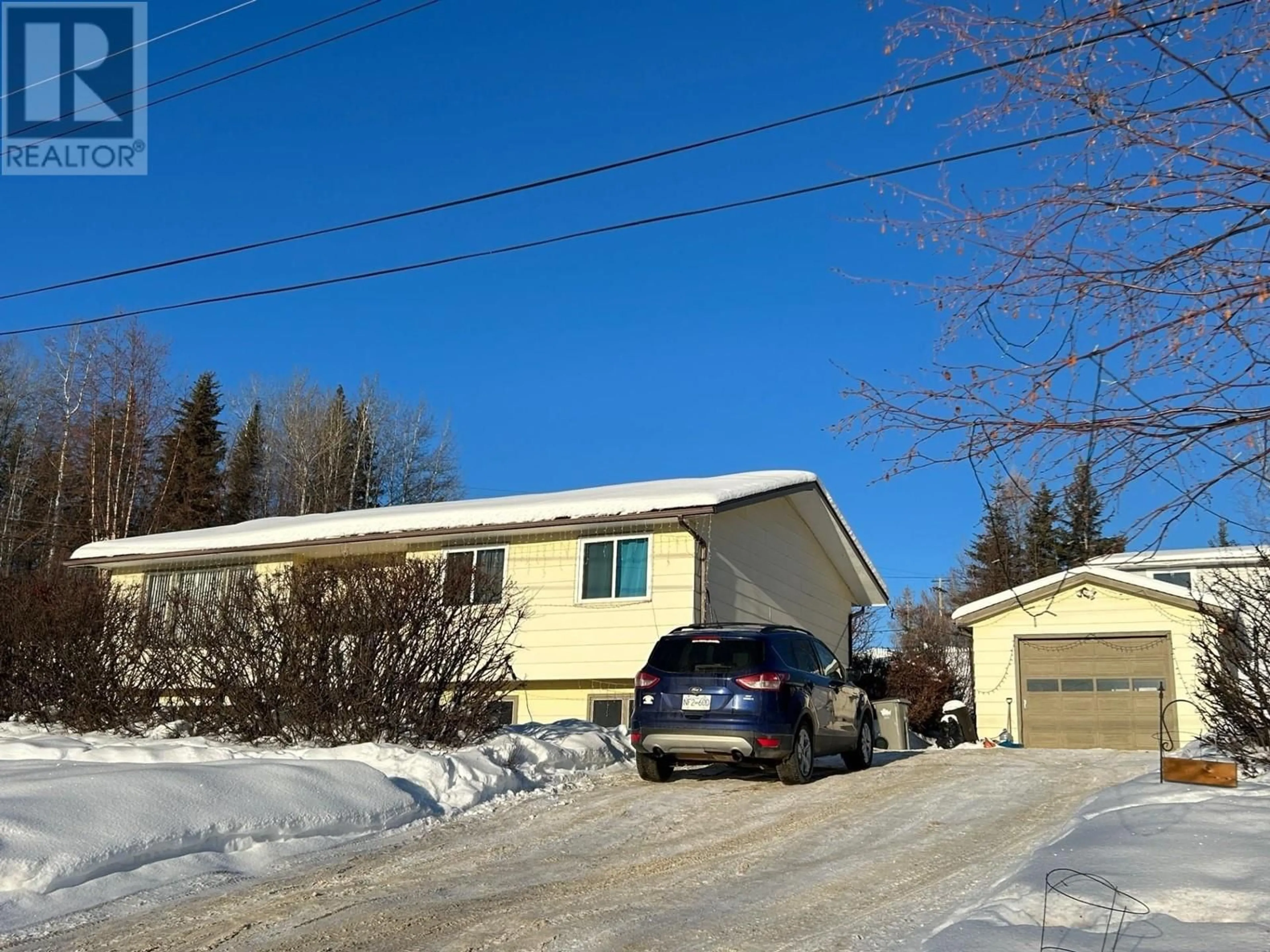 A pic from outside/outdoor area/front of a property/back of a property/a pic from drone, street for 5420 53 AVENUE, Fort Nelson British Columbia V0C1R0