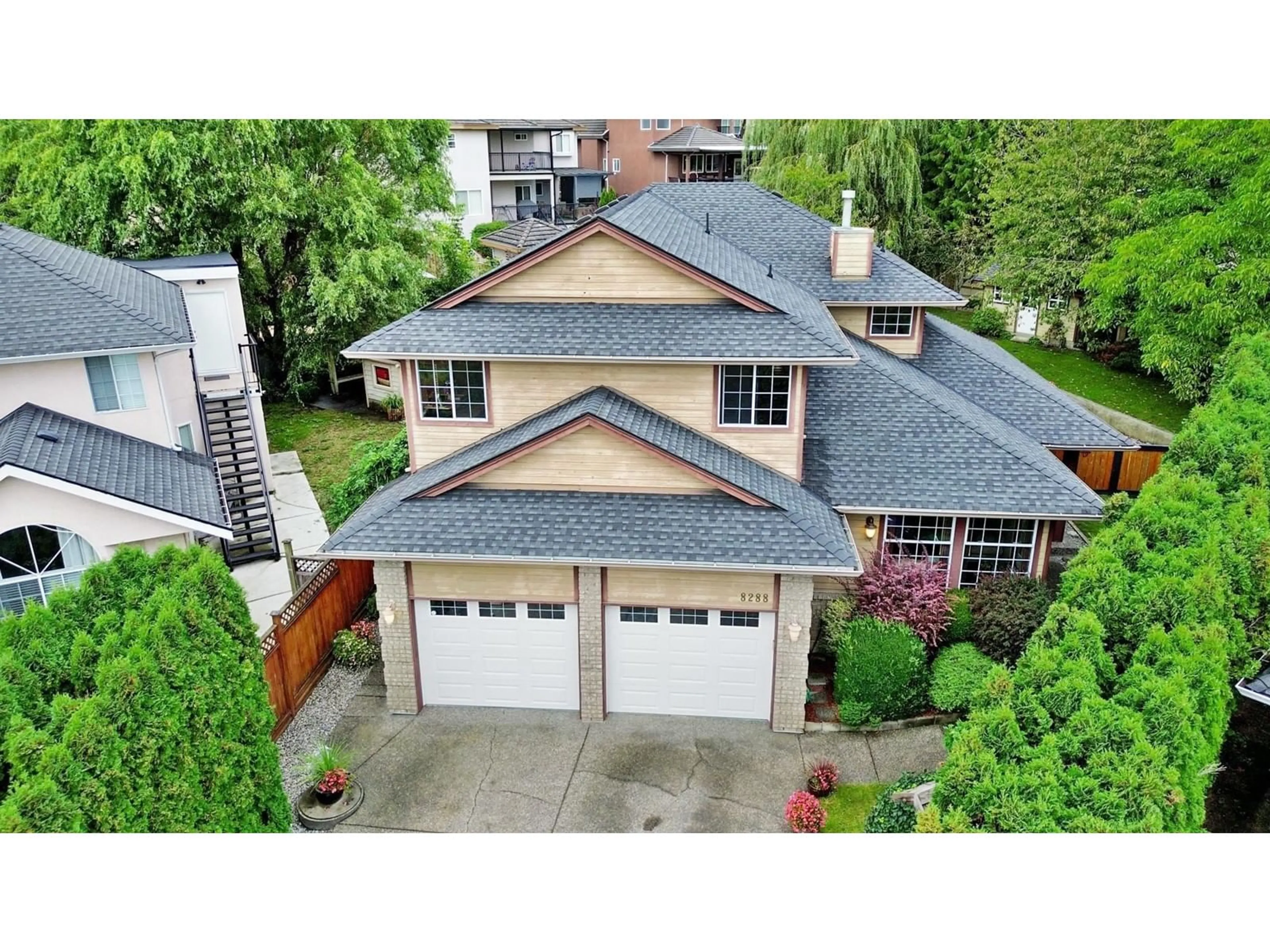 A pic from outside/outdoor area/front of a property/back of a property/a pic from drone, street for 8288 153B STREET, Surrey British Columbia V3S8K6