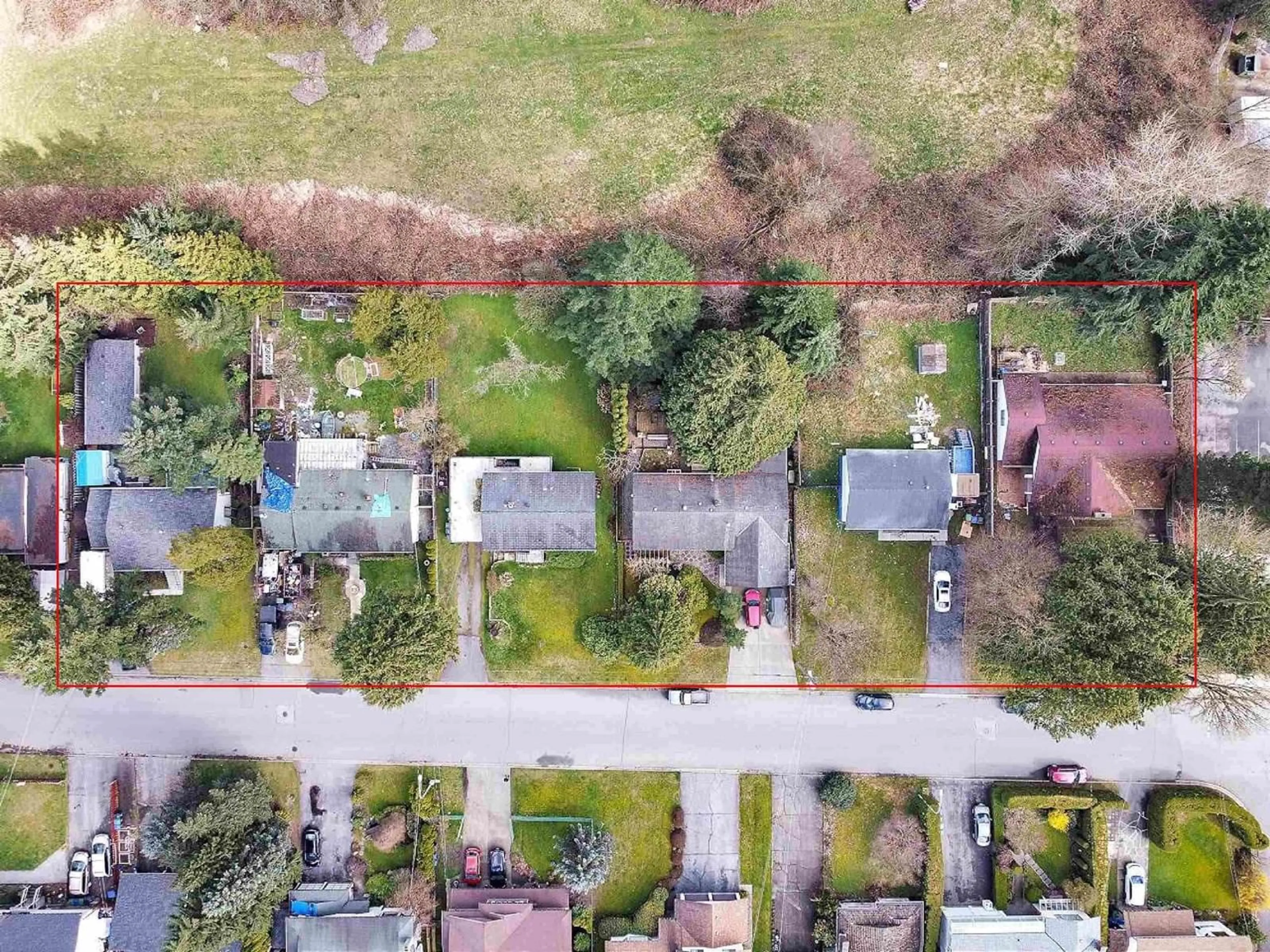 A pic from outside/outdoor area/front of a property/back of a property/a pic from drone, street for 10464 154A STREET, Surrey British Columbia V3R4K1