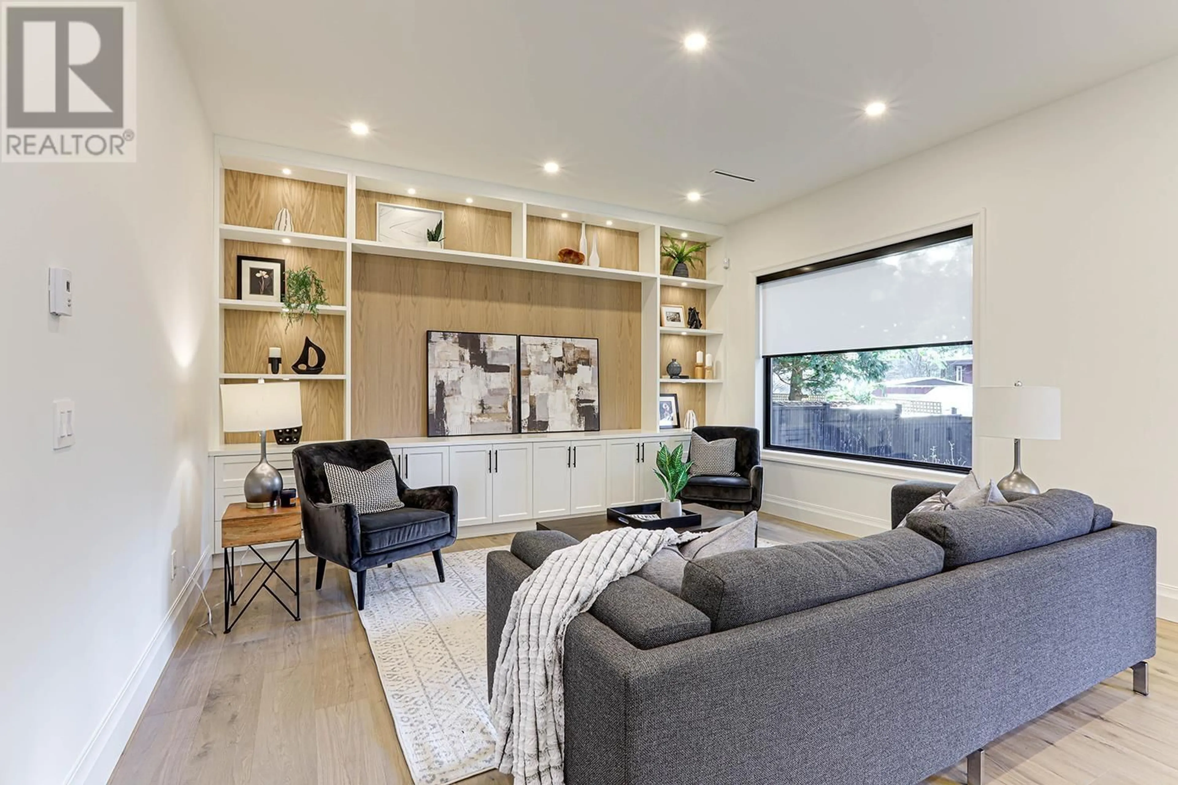 Living room with furniture, wood/laminate floor for 4888 2 AVENUE, Delta British Columbia V4M1C8