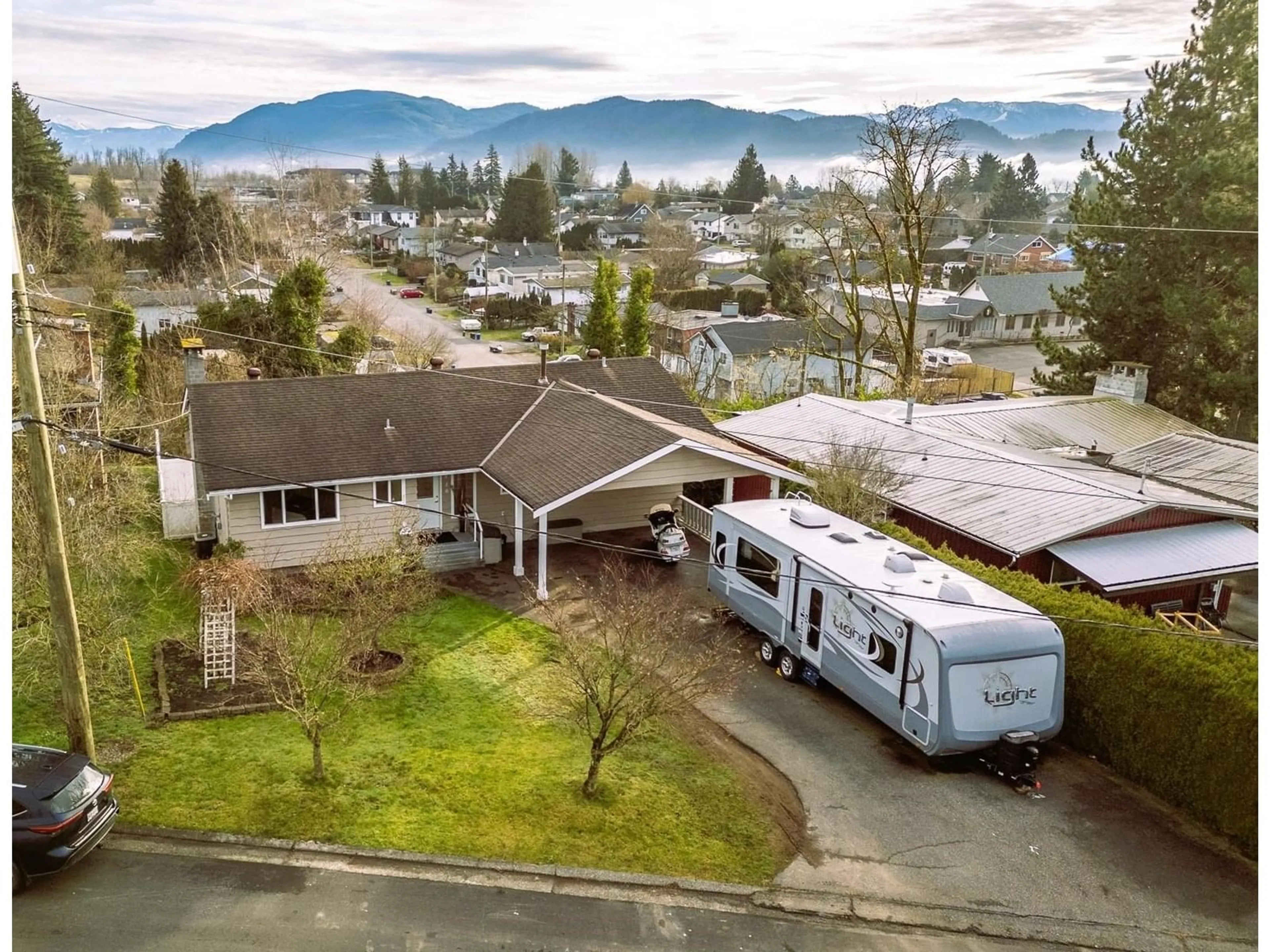 A pic from outside/outdoor area/front of a property/back of a property/a pic from drone, mountain view for 33416 HEATHER AVENUE, Mission British Columbia V3A7Z3