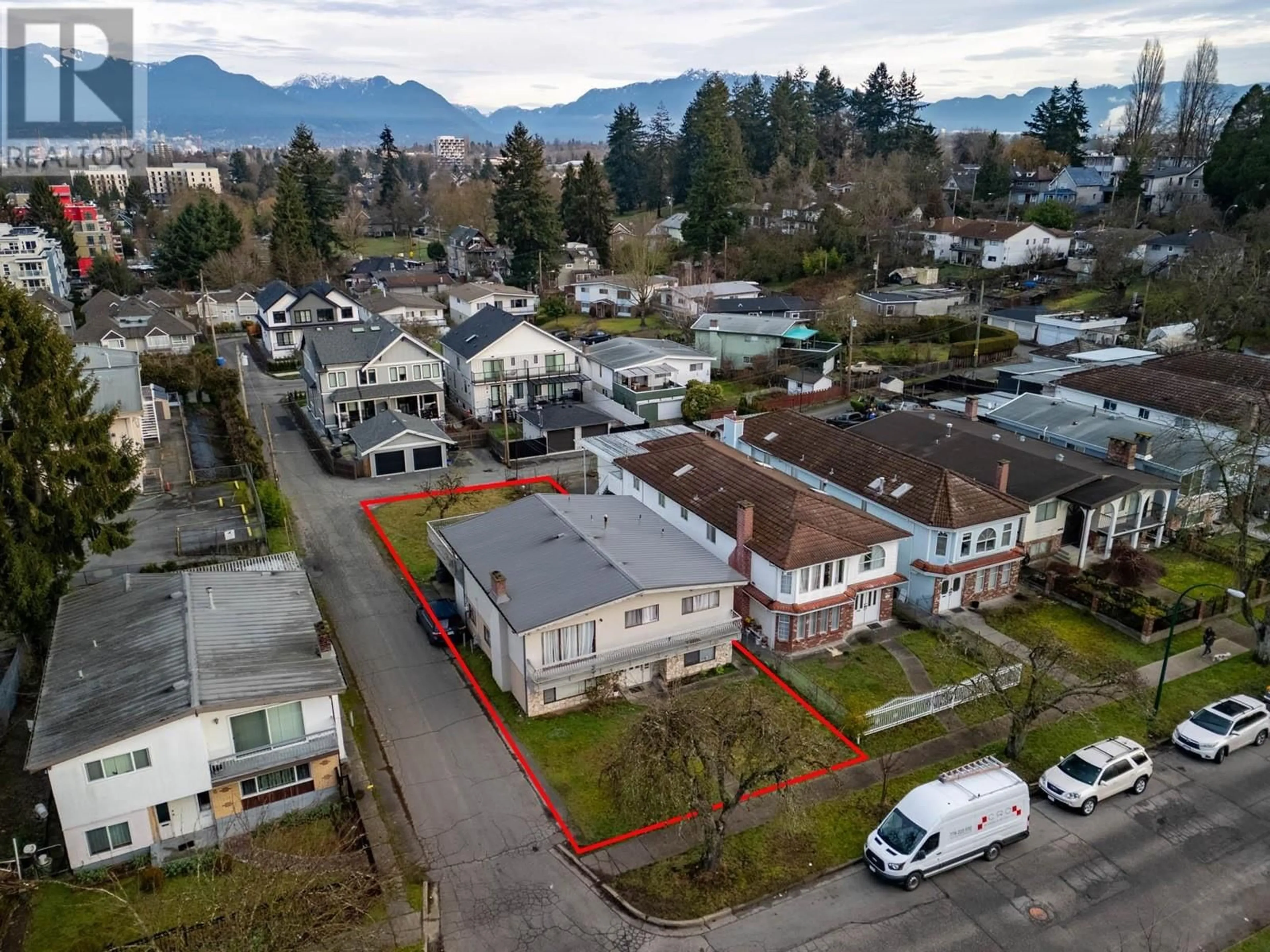 A pic from outside/outdoor area/front of a property/back of a property/a pic from drone, mountain view for 1425 E 18TH AVENUE, Vancouver British Columbia V5N2H2